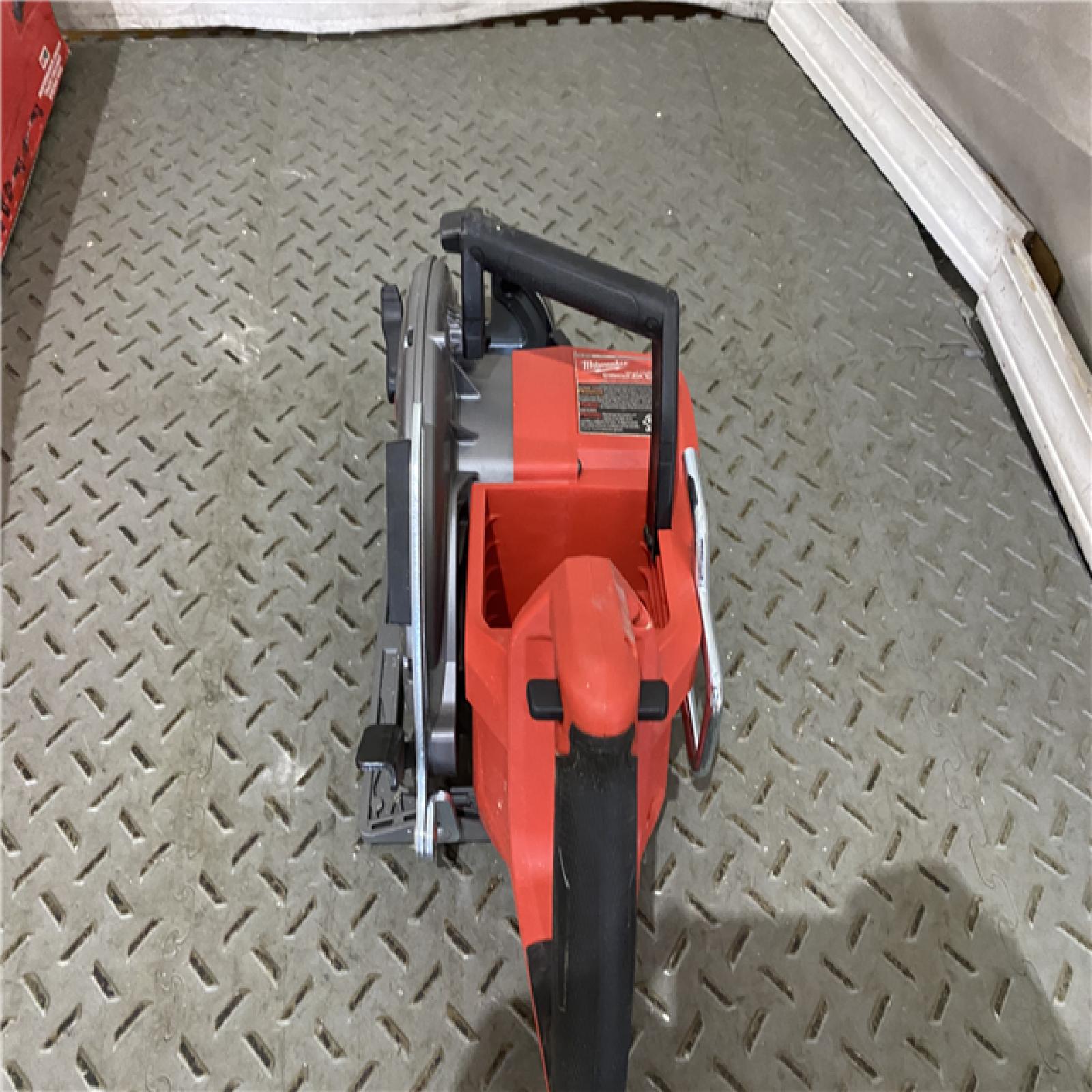 Houston location AS-IS Milwaukee 2830-20 Rear Handle Circular Saw M18 FUEL 7-1/4  Cordless Brushless Tool Only