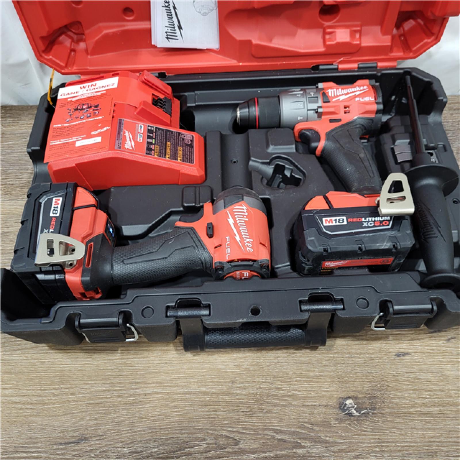 AS-IS M18 FUEL 18V Lithium-Ion Brushless Cordless Hammer Drill and Impact Driver Combo Kit (2-Tool) with 2 Batteries