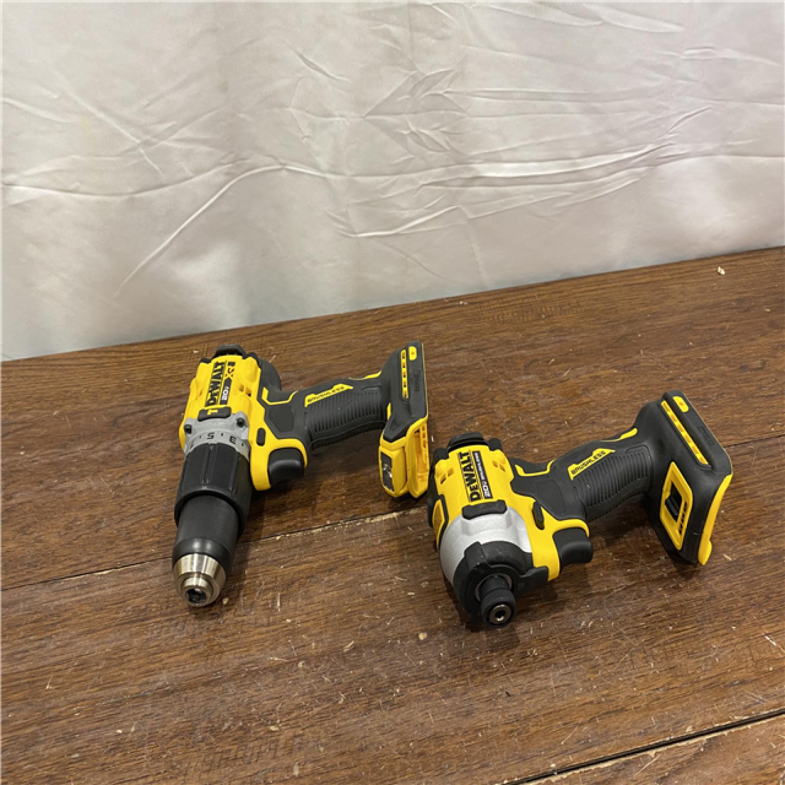 AS-ISDEWALT 20V MAX XR Hammer Drill and ATOMIC Impact Driver 2 Tool Cordless Combo Kit with (2) 4.0Ah Batteries, Charger, and Bag