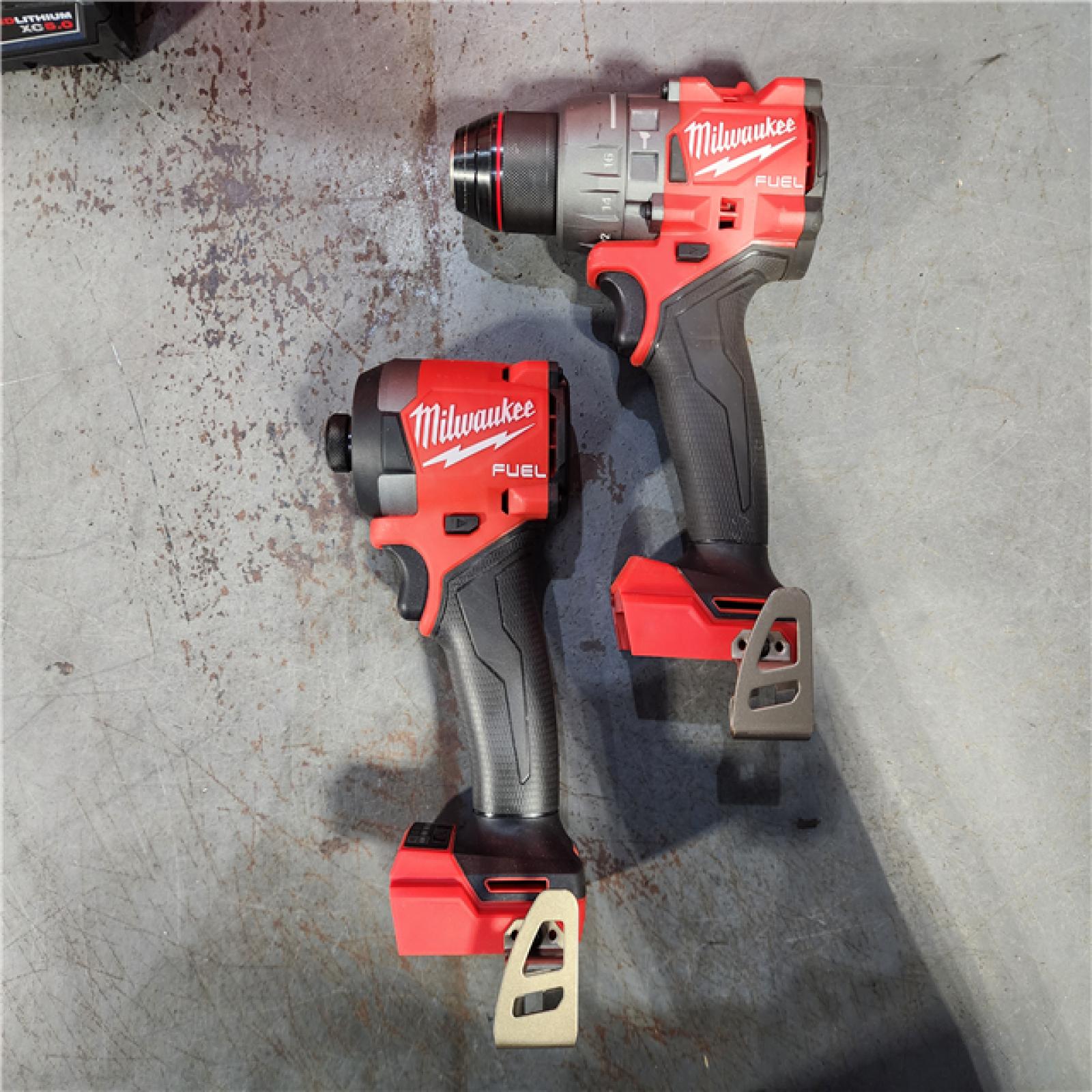 HOUSTON LOCATION - AS-IS Milwaukee M18 FUEL 18V Lithium-Ion Brushless Cordless Hammer Drill and Impact Driver Combo Kit (2-Tool) with 2 Batteries