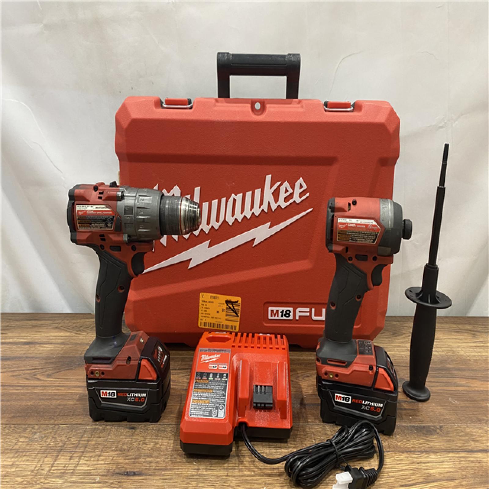 AS IS Milwaukee M18 FUEL 18V Lithium-Ion Brushless Cordless Hammer Drill and Impact Driver Combo Kit (2-Tool) with 2 Batteries