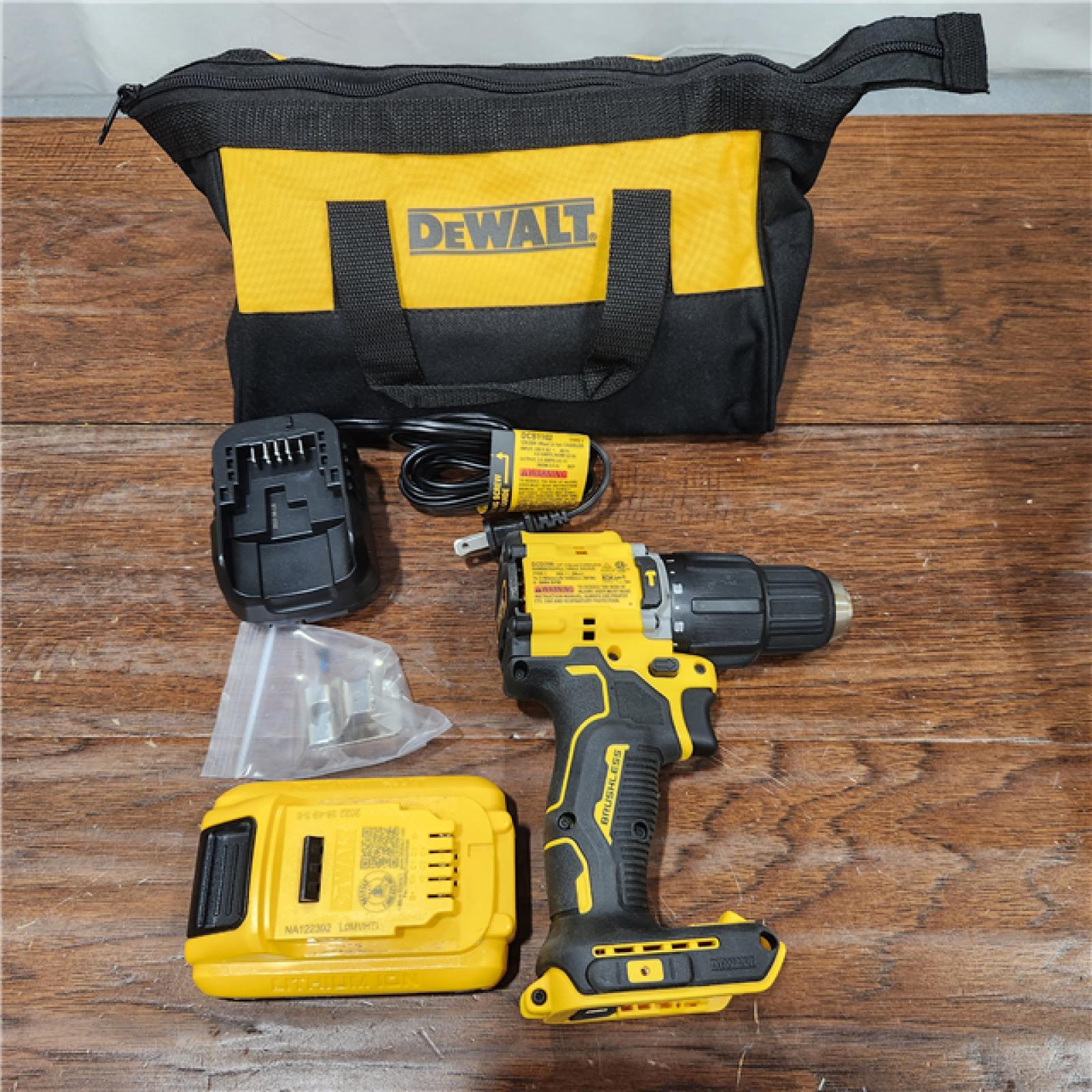 AS-IS DEWALT ATOMIC 20-Volt Lithium-Ion Cordless 1/2 in. Compact Hammer Drill with 3.0Ah Battery, Charger and Bag