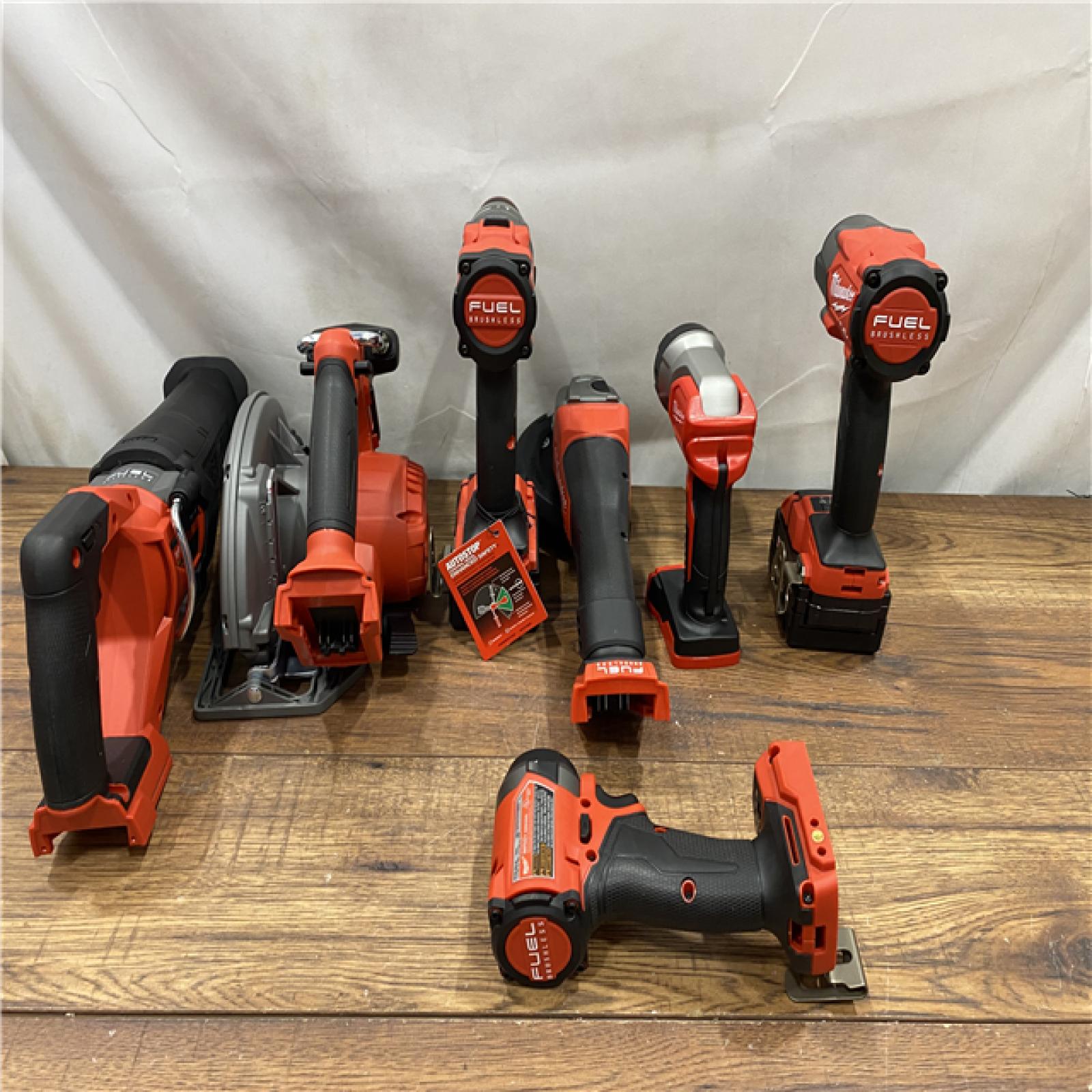 AS IS Milwaukee M18 FUEL 18V Lithium-Ion Brushless Cordless Combo Kit with Two 5.0 Ah Batteries  1 Charger  2 Tool Bags (7-Tool)