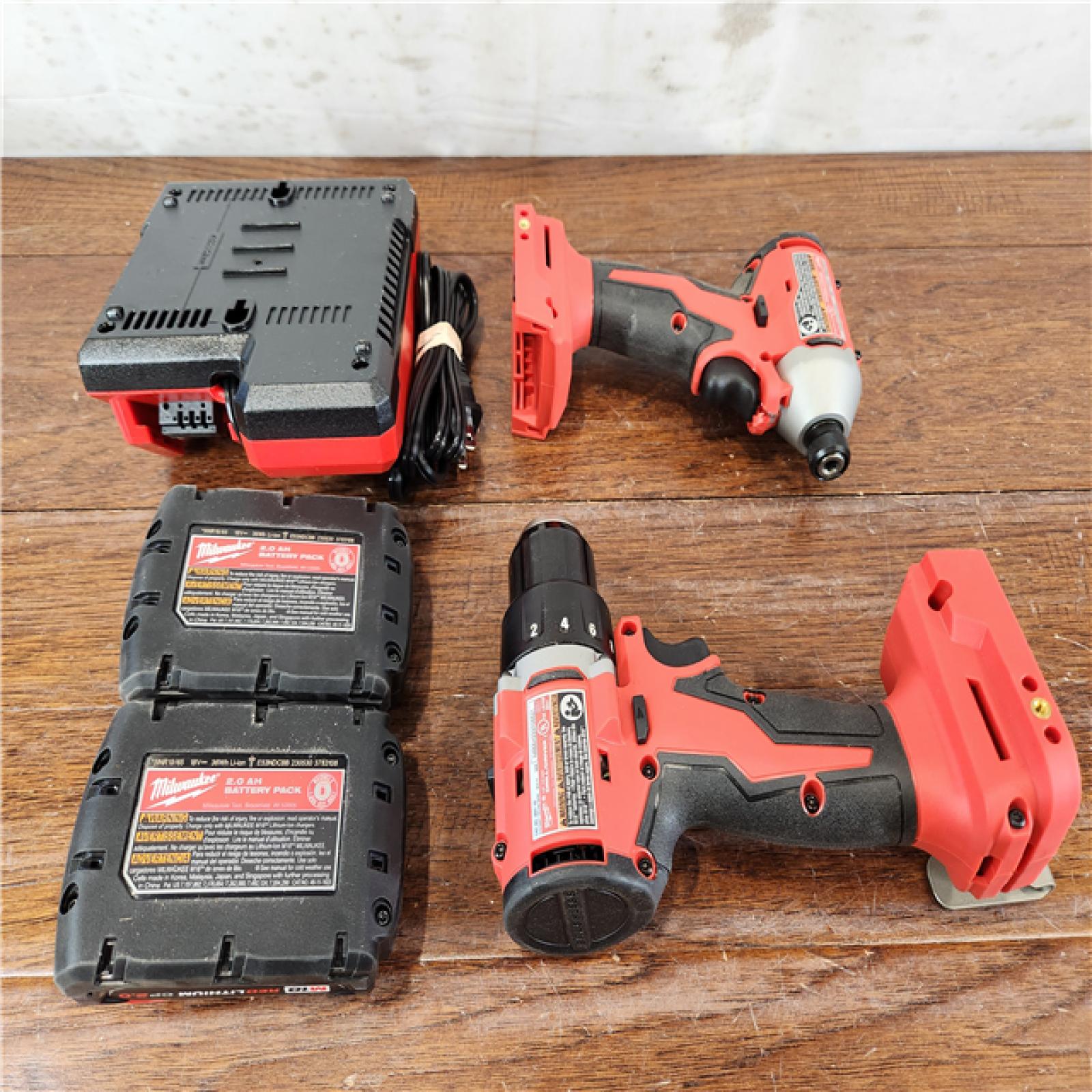 AS-IS Milwaukee M18 Lithium-Ion Brushless Cordless (2-Tool) Compact Drill/Impact Combo Kit