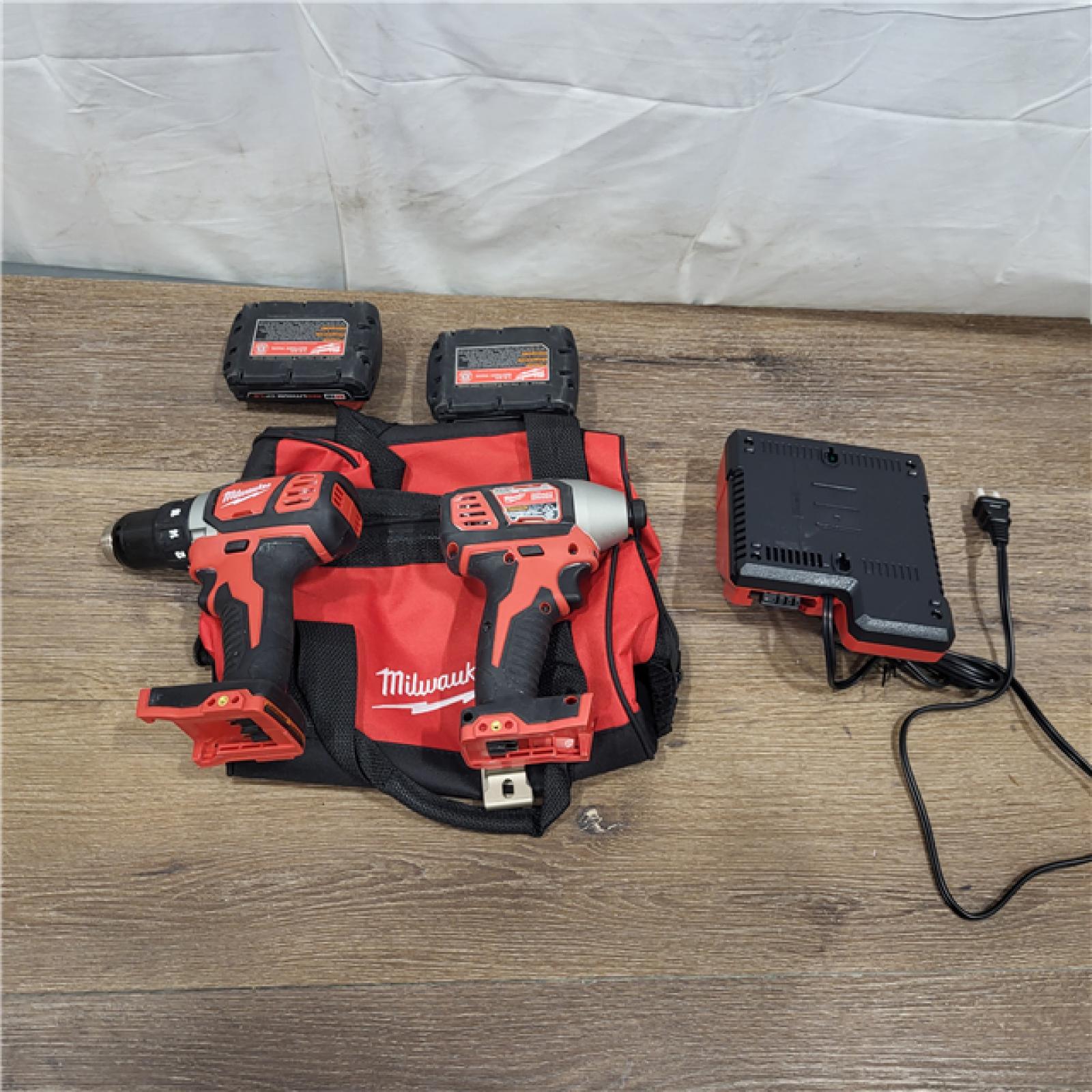 AS-IS Milwaukee M18 18V Cordless Brushed 2 Tool Drill/Driver and Impact Driver Kit