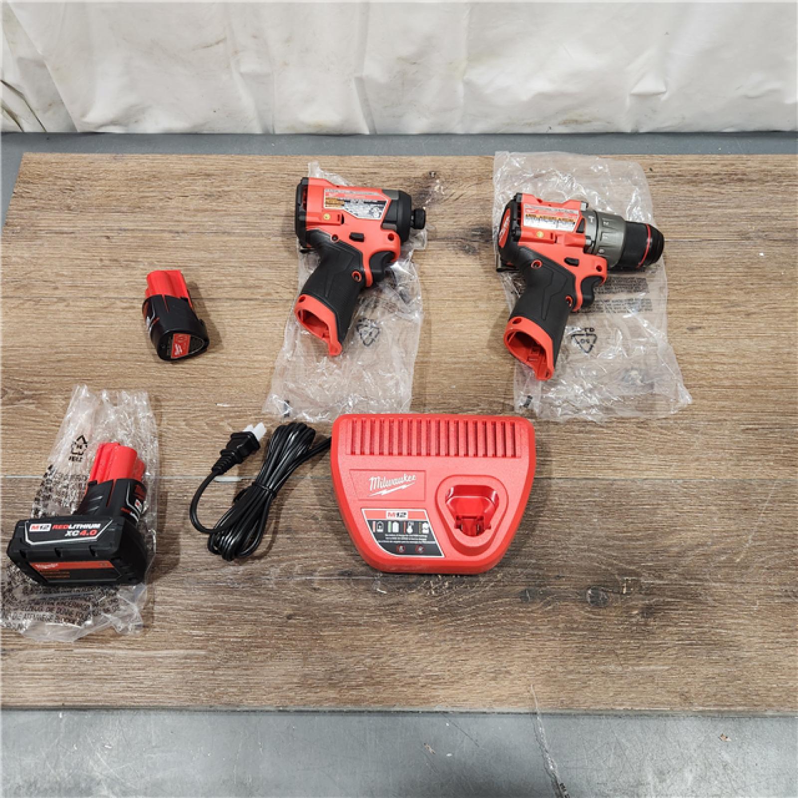 AS-IS Milwaukee 3497-22 12V Brushless Hammer Drill and Impact Driver Combo Kit