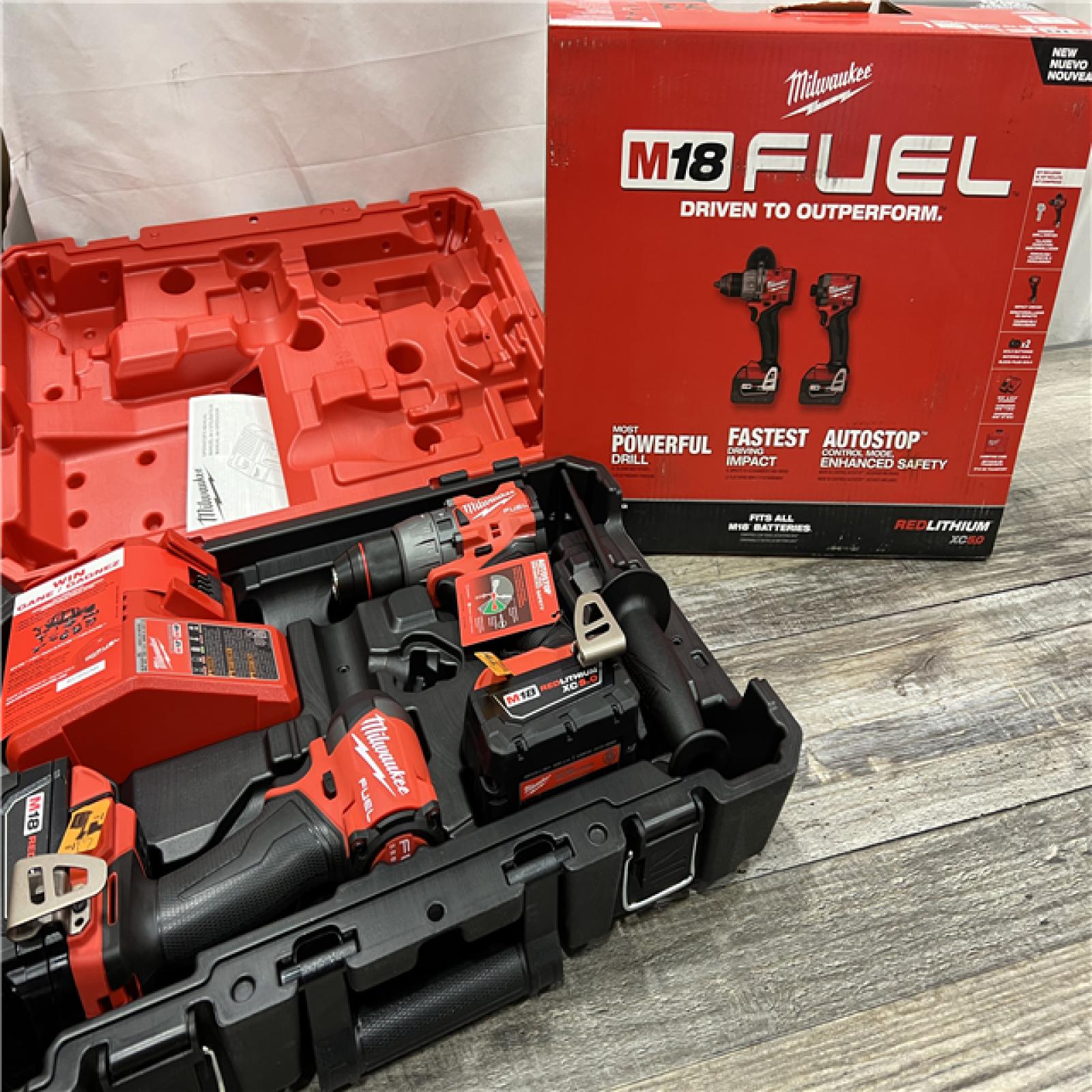 AS-IS Milwaukee M18 FUEL 18V Lithium-Ion Brushless Cordless Hammer Drill and Impact Driver Combo Kit (2-Tool) with 2 Batteries