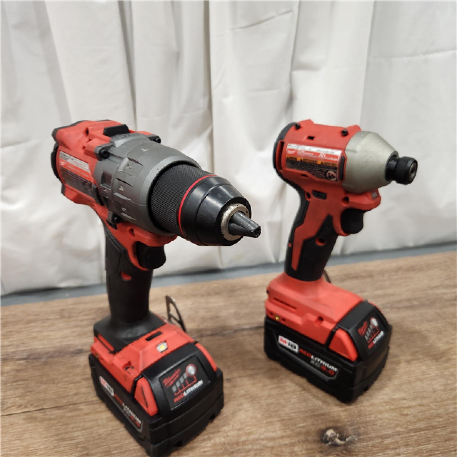 AS-IS Milwaukee M18 FUEL 18V Lithium-Ion Brushless Cordless Hammer Drill and Impact Driver Combo Kit (2-Tool) with 2 Batteries