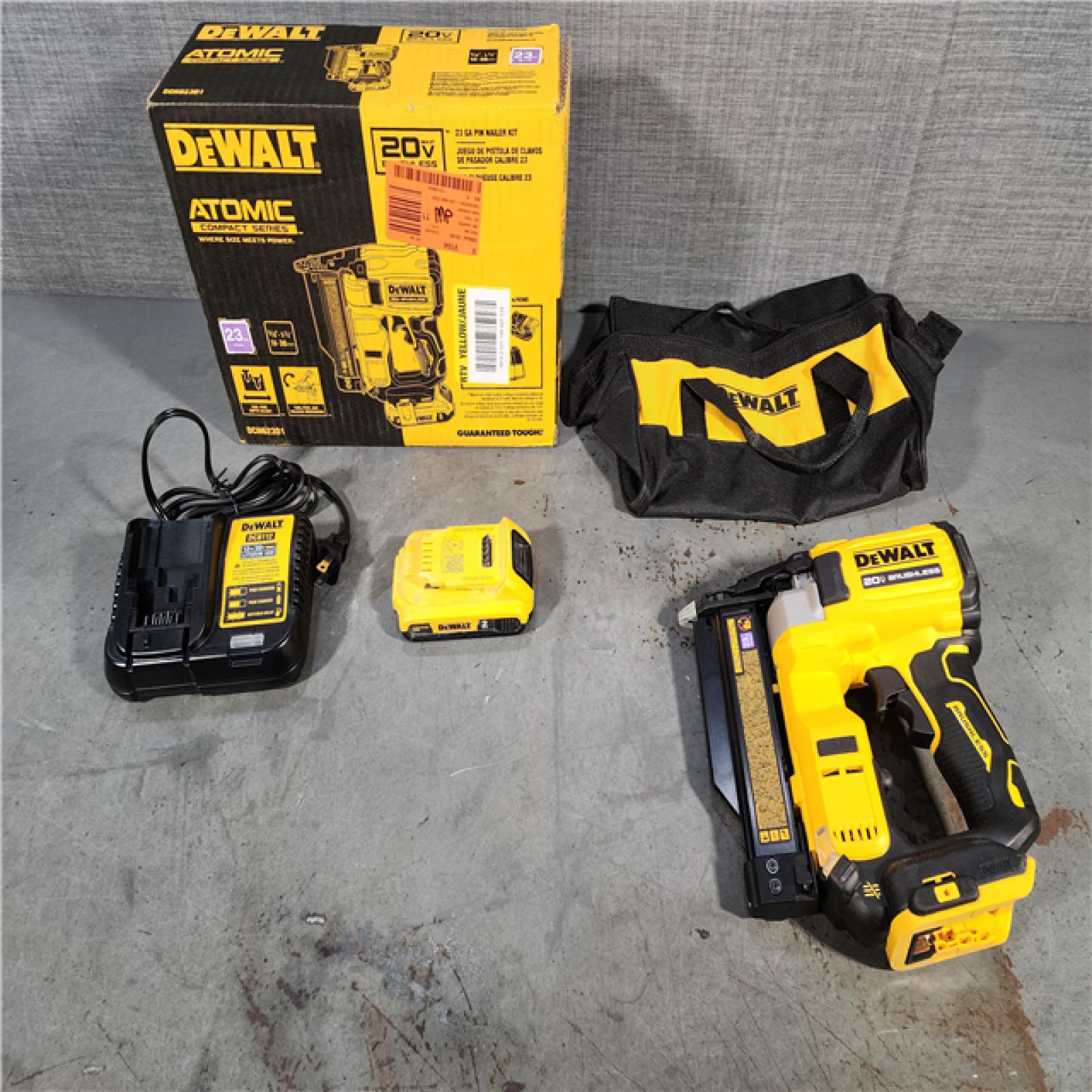 HOUSTON LOCATION - AS-IS DEWALT ATOMIC 20V MAX Lithium Ion Cordless 23 Gauge Pin Nailer Kit with 2.0Ah Battery and Charger