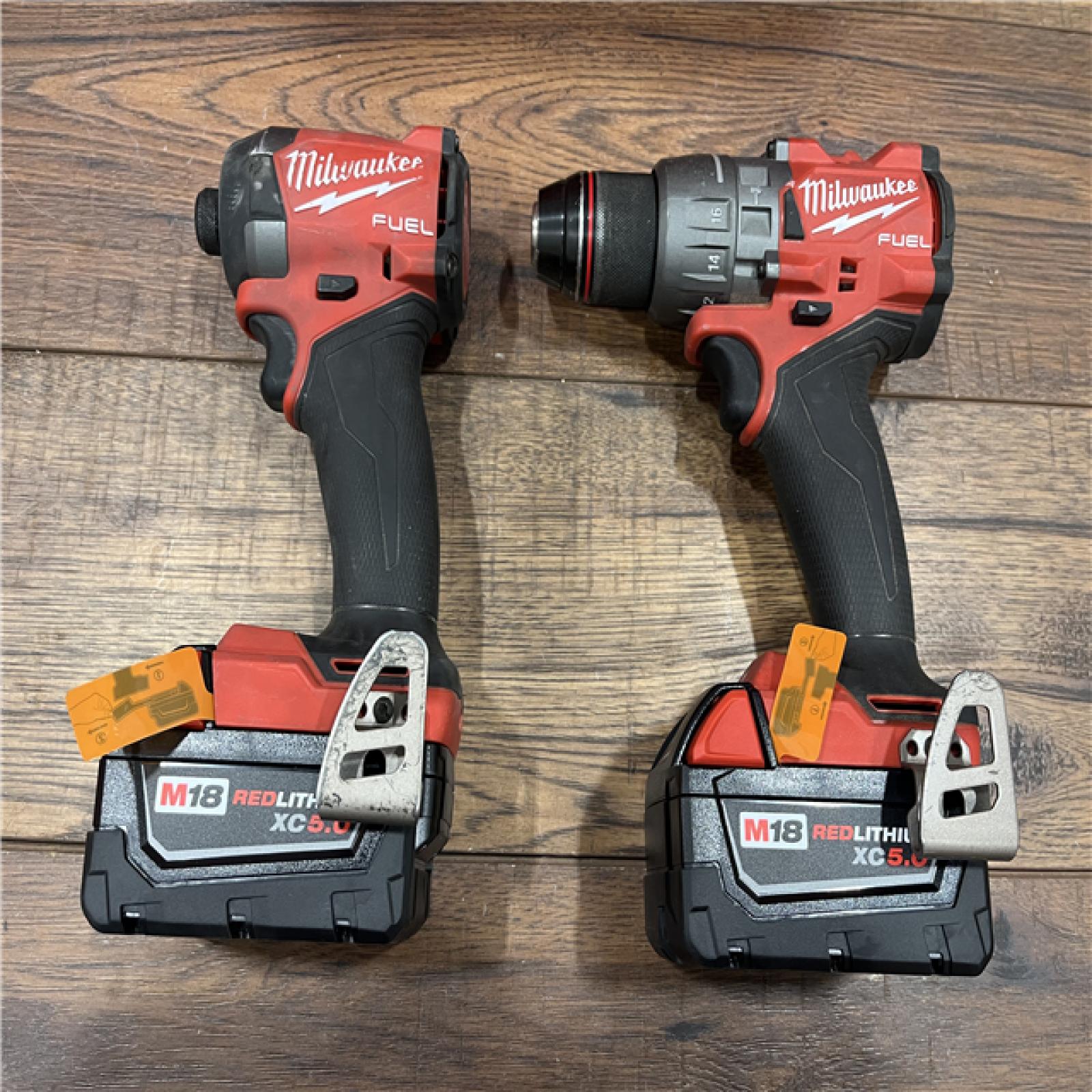 AS-IS Milwaukee M18 FUEL 18V Lithium-Ion Brushless Cordless Hammer Drill and Impact Driver Combo Kit (2-Tool) with 2 Batteries