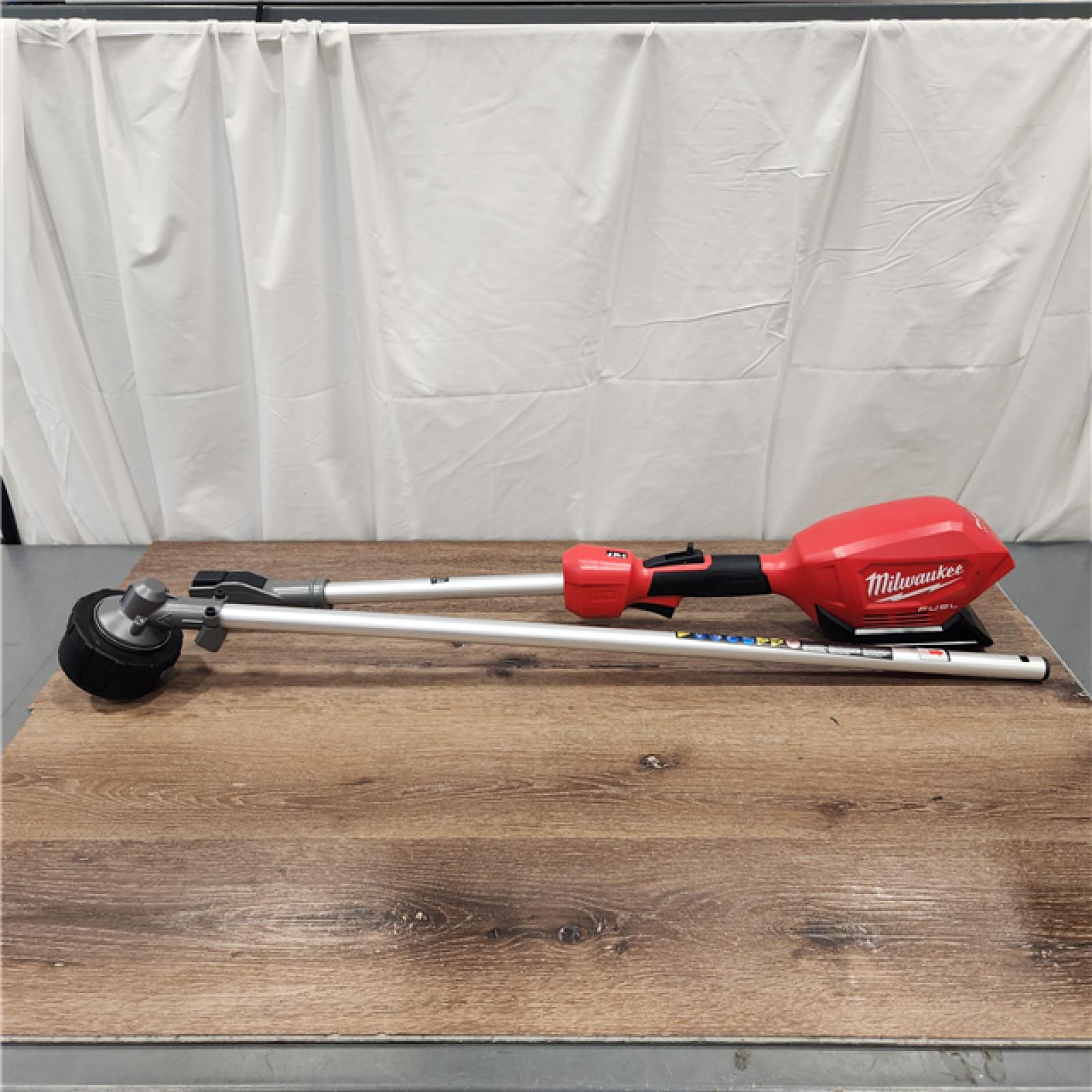 AS-IS M18 FUEL 18V Lithium-Ion Brushless Cordless String Trimmer with QUIK-LOK Attachment Capability and 8.0 Ah Battery