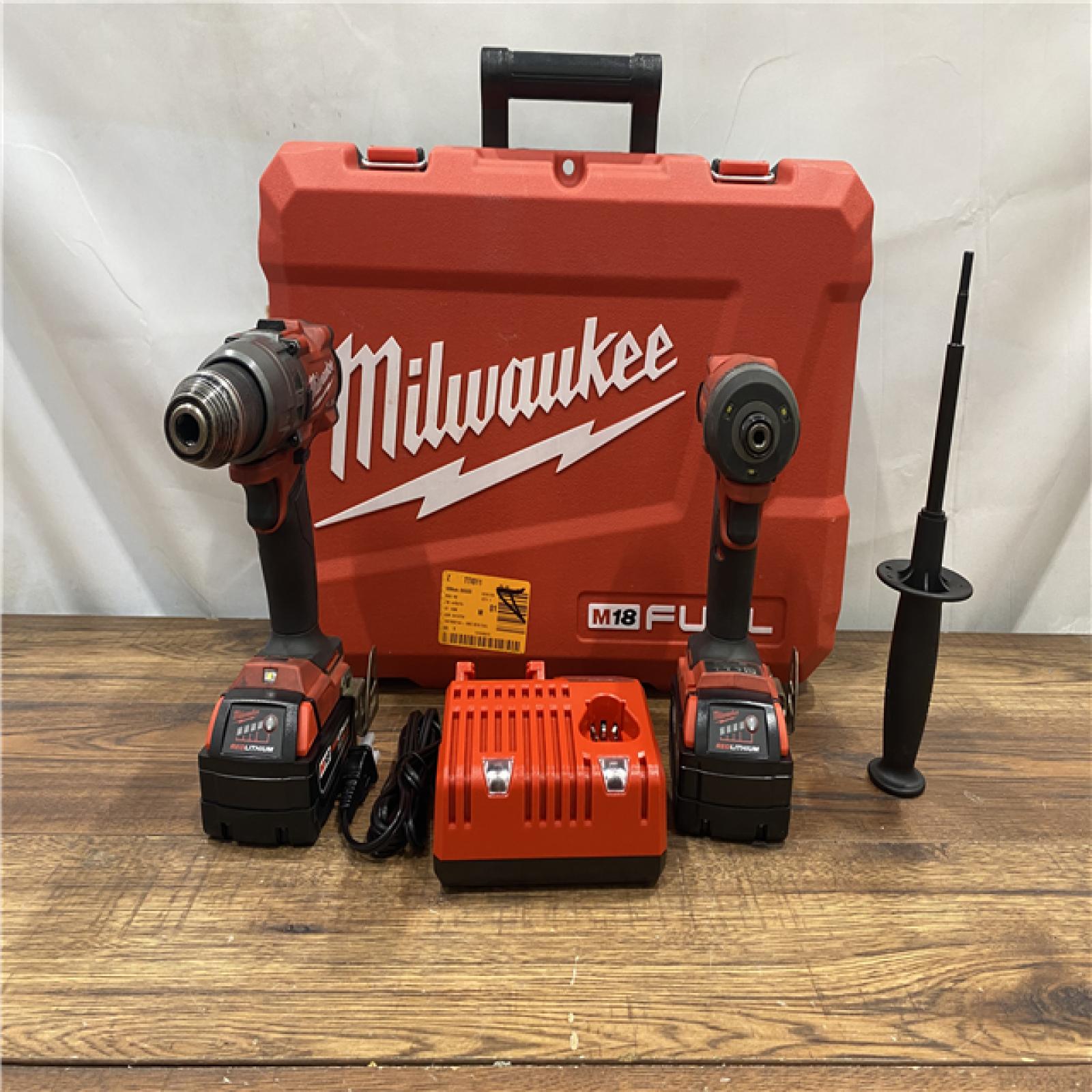 AS IS Milwaukee M18 FUEL 18V Lithium-Ion Brushless Cordless Hammer Drill and Impact Driver Combo Kit (2-Tool) with 2 Batteries