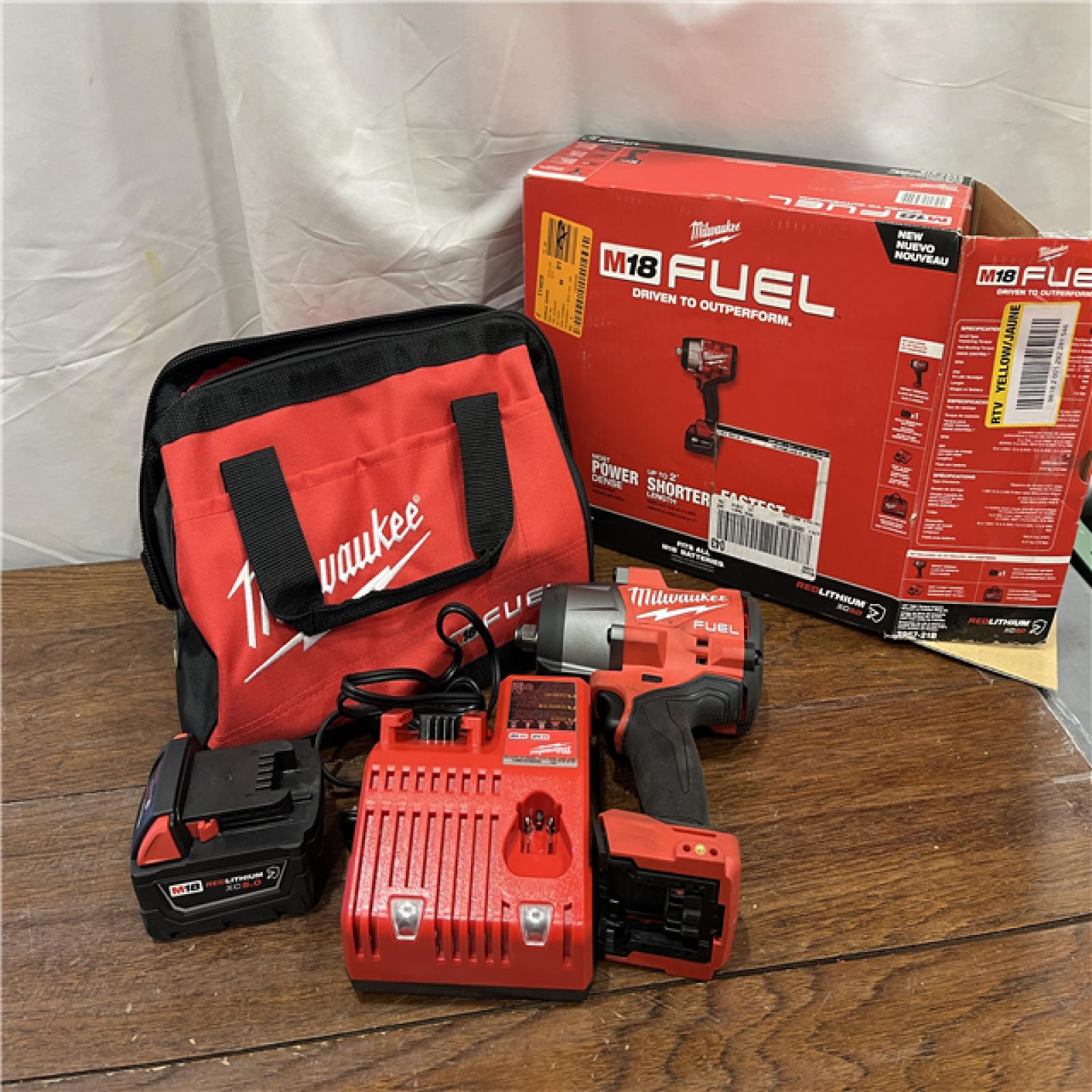 AS-ISMilwaukee M18 1/2 in. Cordless Brushless High Torque Impact Wrench Kit (Battery & Charger)