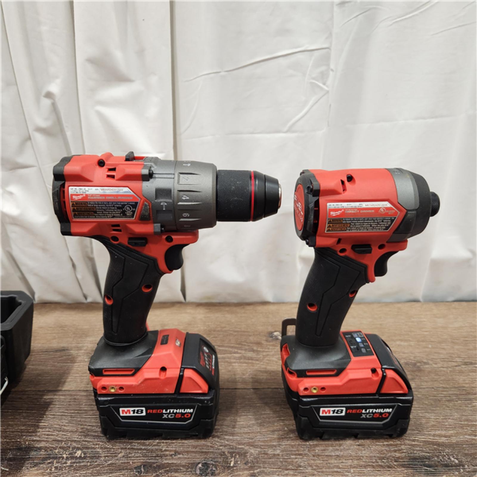 AS-IS Milwaukee M18 FUEL 18V Lithium-Ion Brushless Cordless Hammer Drill and Impact Driver Combo Kit (2-Tool) with 2 Batteries