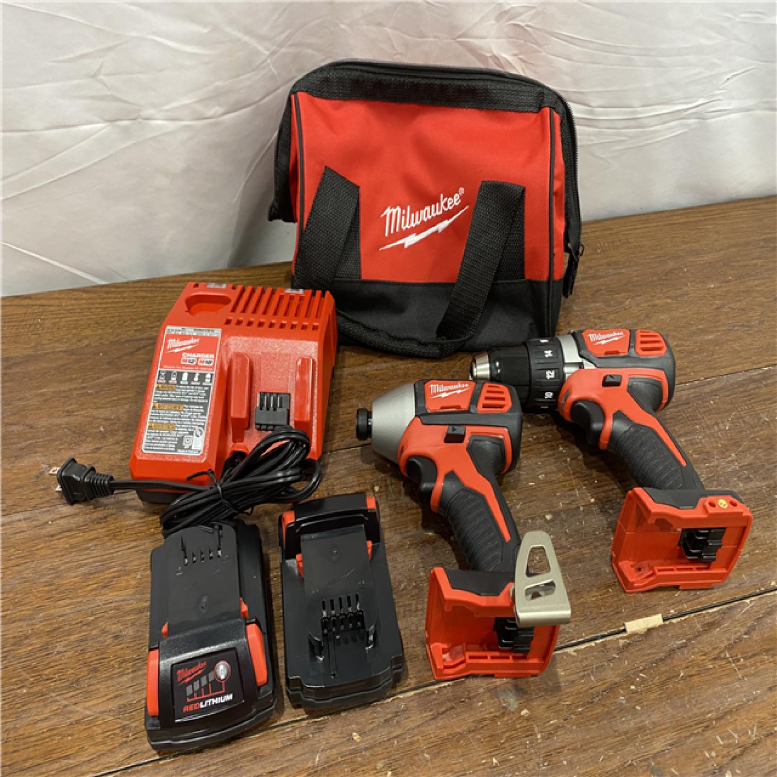 AS-ISMilwaukee M18 18V Cordless Brushed 2 Tool Drill/Driver and Impact Driver Kit