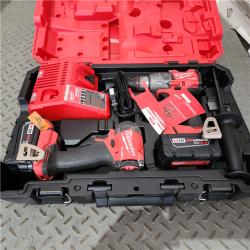 Houston location AS-IS Milwaukee 3697-22 M18 FUEL 1/2 Hammer Driller/Driver &1/4 Hex Impact Driver 2 Tool Combo Kit