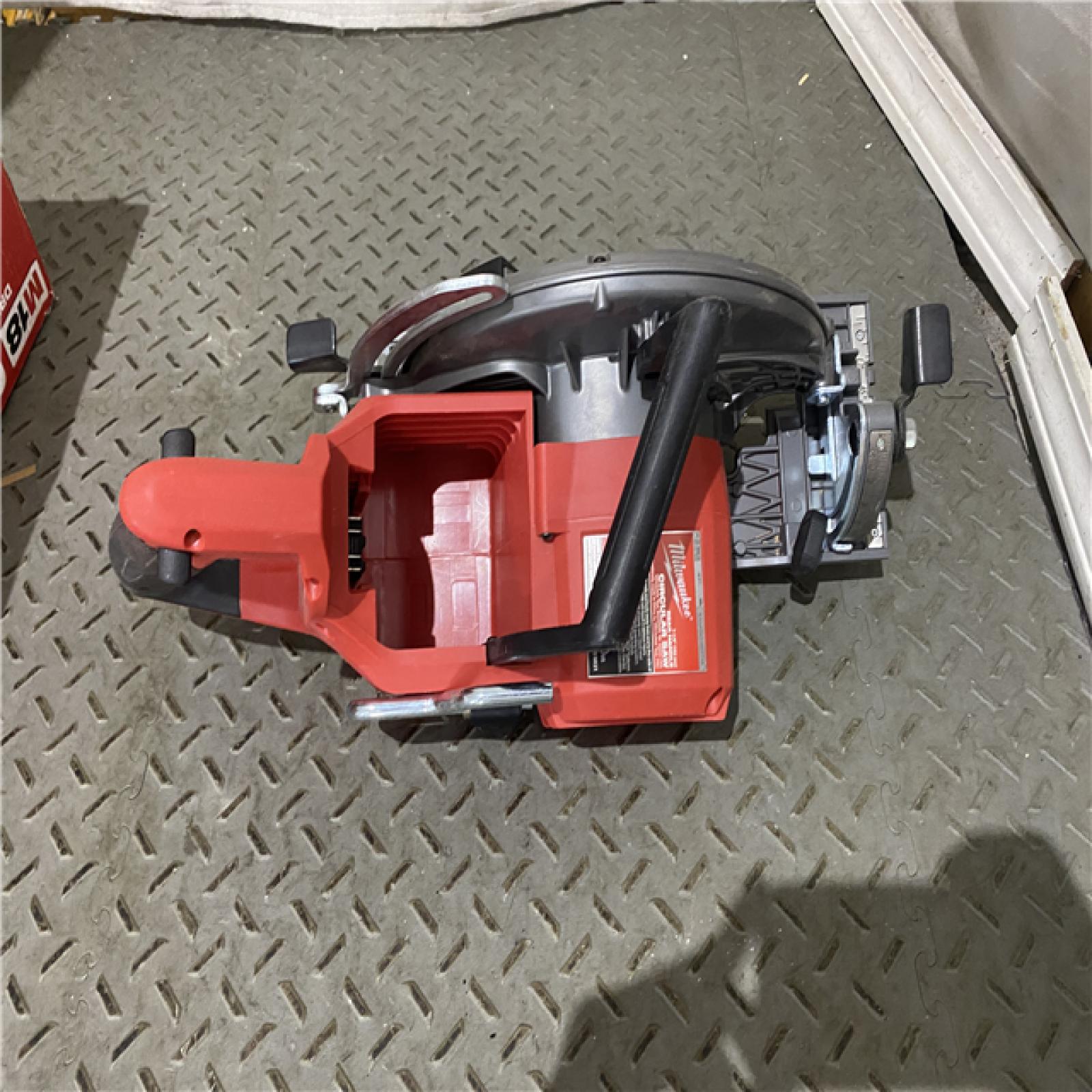 Houston location AS-IS Milwaukee 2830-20 Rear Handle Circular Saw M18 FUEL 7-1/4  Cordless Brushless Tool Only