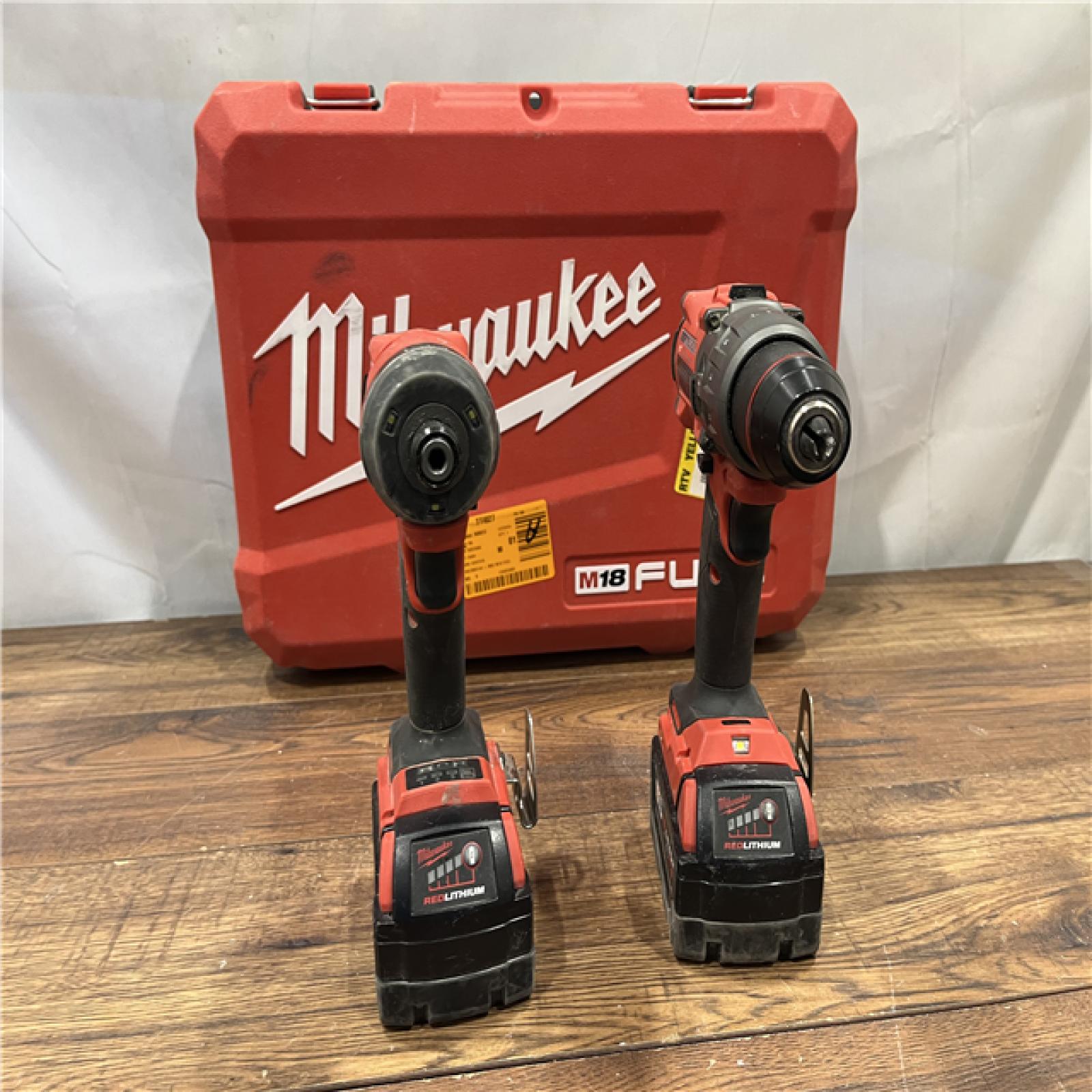 AS-IS Milwaukee M18 FUEL 18V Lithium-Ion Brushless Cordless Hammer Drill and Impact Driver Combo Kit (2-Tool) with 2 Batteries