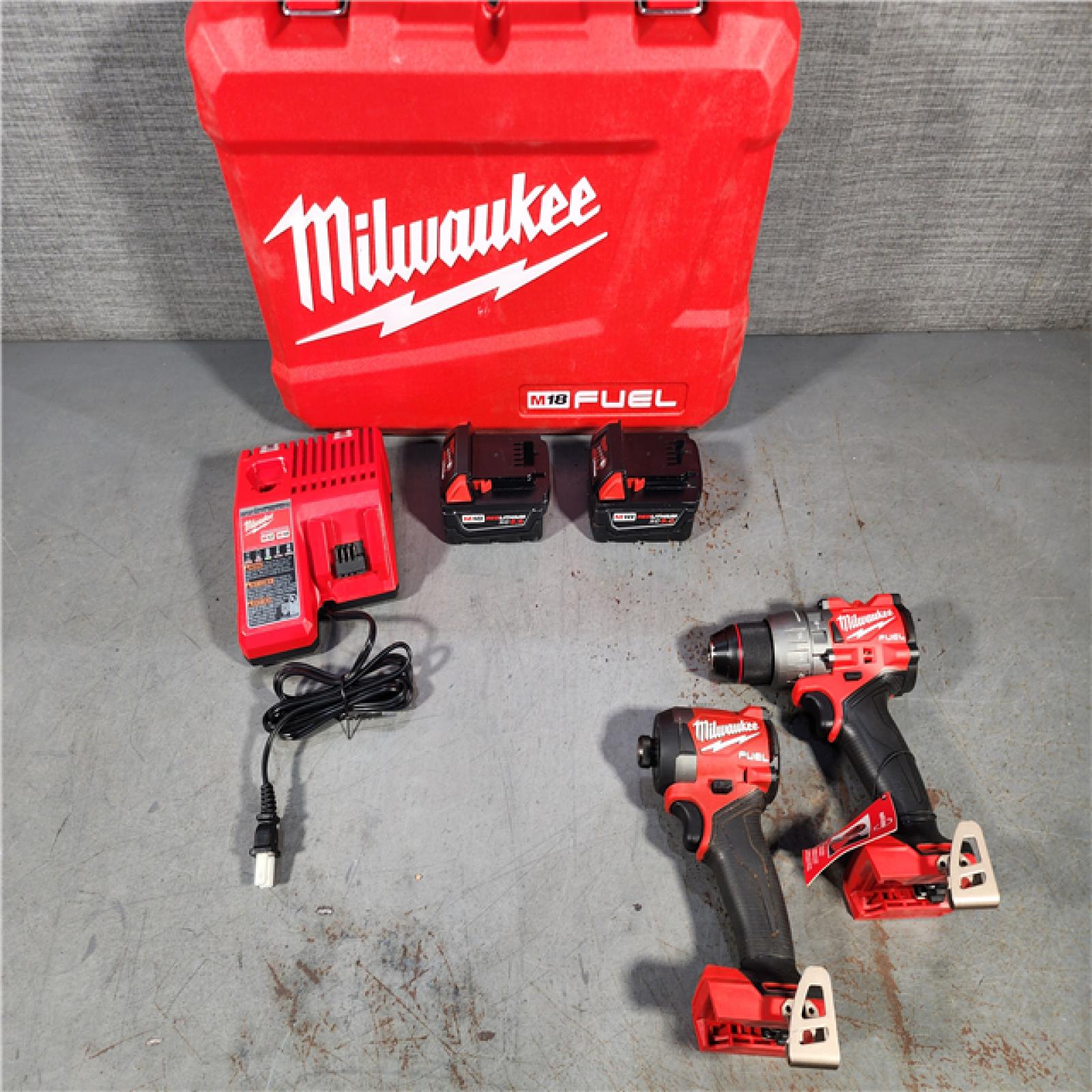 HOUSTON LOCATION - AS-IS Milwaukee M18 FUEL 18V Lithium-Ion Brushless Cordless Hammer Drill and Impact Driver Combo Kit (2-Tool) with 2 Batteries