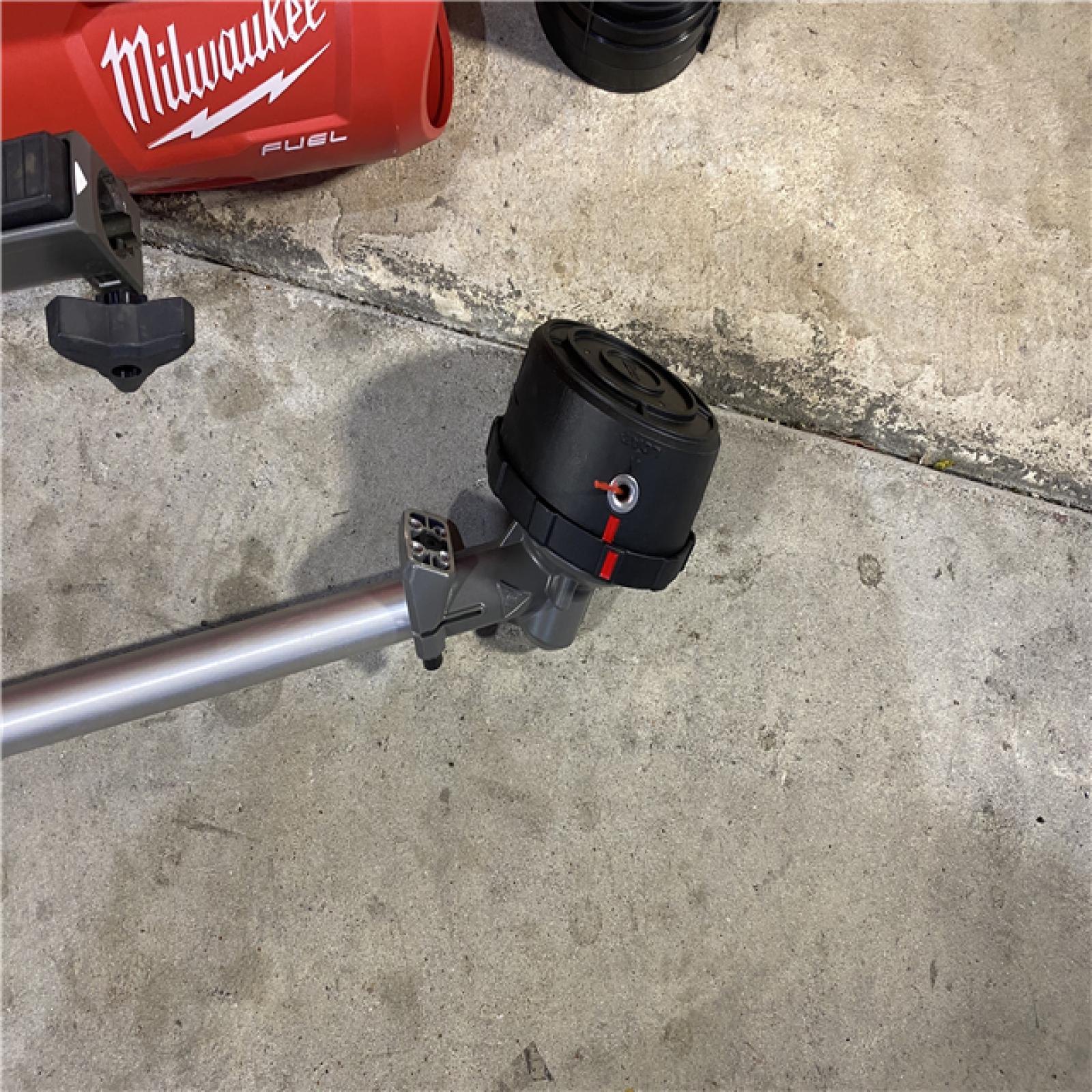 HOUSTON LOCATION -AS-IS Milwaukee 3000-21 M18 FUEL Brushless Lithium-Ion Cordless String Trimmer with QUIK-LOK / Blower Combo Kit (8 Ah) (NO BATTERY AND CHARGER))