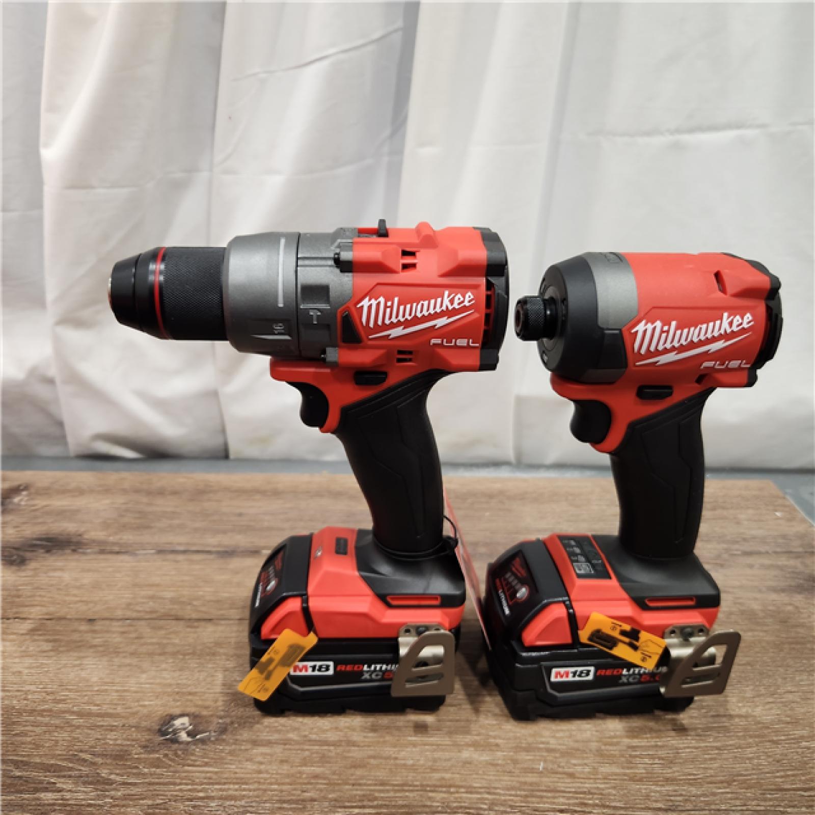 AS-IS Milwaukee M18 FUEL 18V Lithium-Ion Brushless Cordless Hammer Drill and Impact Driver Combo Kit (2-Tool) with 2 Batteries