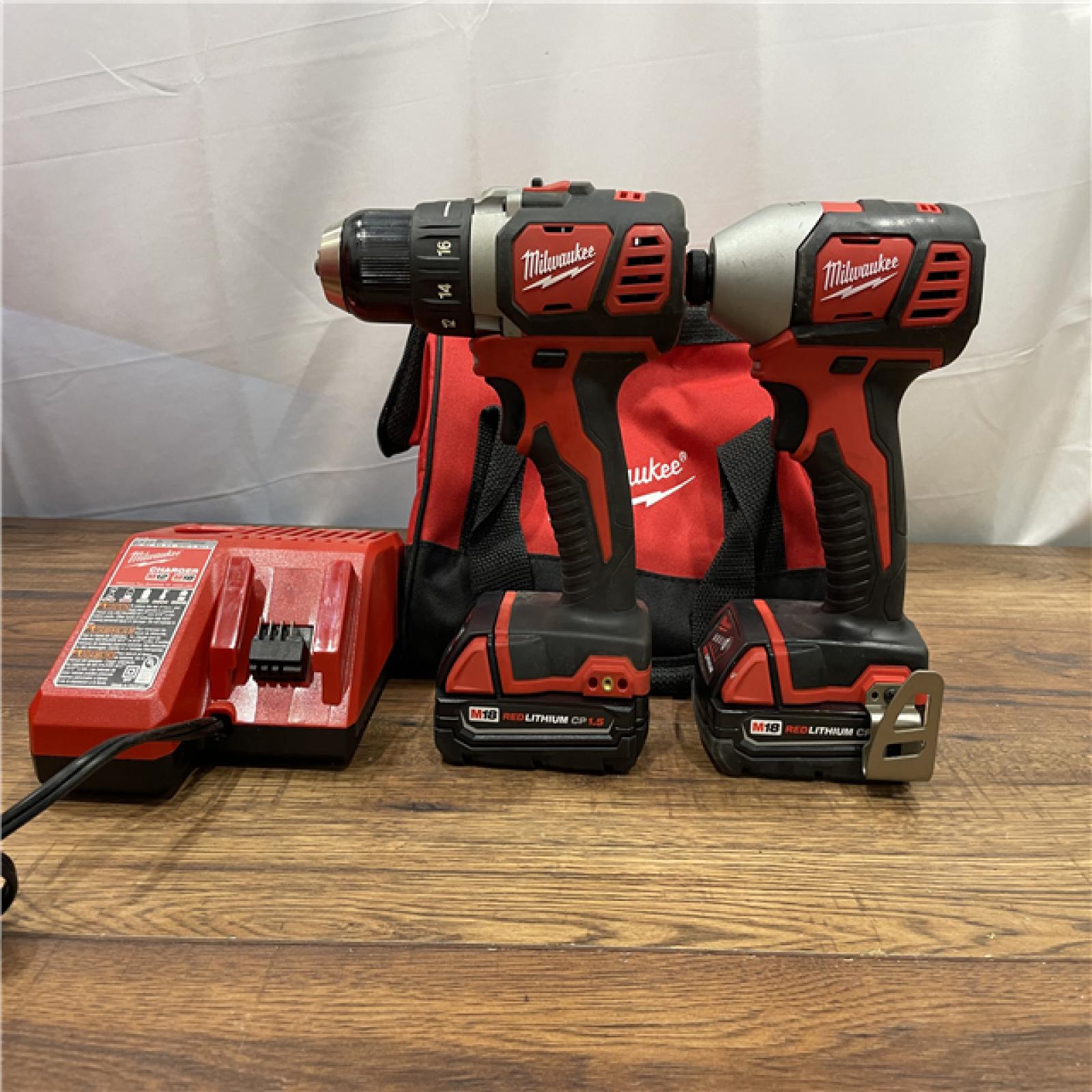 AS-IS Milwaukee M18 Brushed Cordless (2-Tool) Drill/Driver and Impact Driver Kit