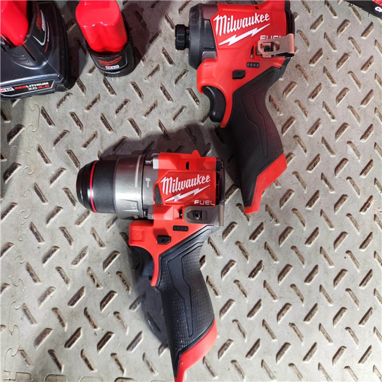 HOUSTON LOCATION - AS-IS (APPEARS LIKE NEW) Milwaukee 3497-22 12V Brushless Hammer Drill and Impact Driver Combo Kit