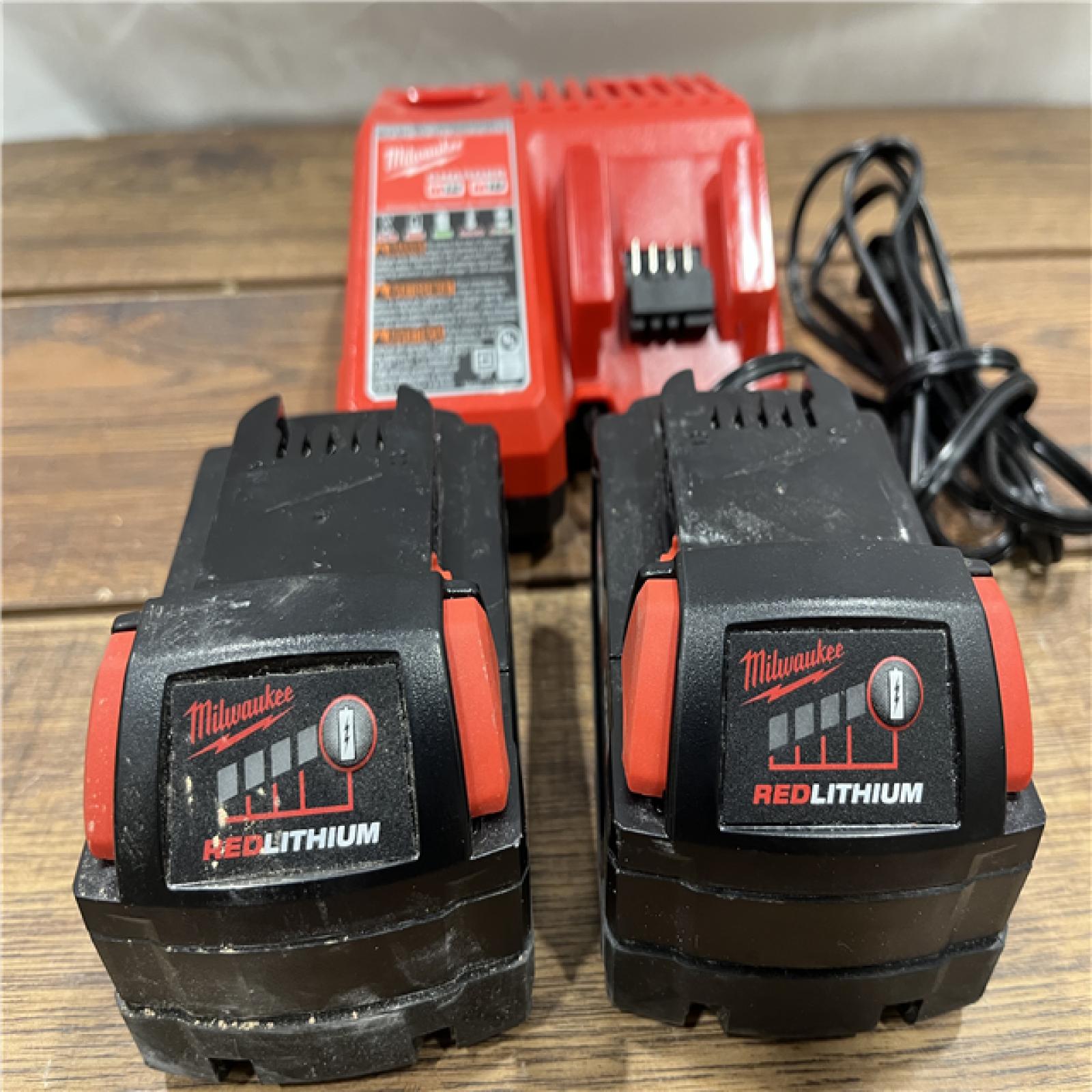 AS-IS Milwaukee M18 18-Volt Lithium-Ion XC Starter Kit with Two 5.0Ah Batteries and Charger