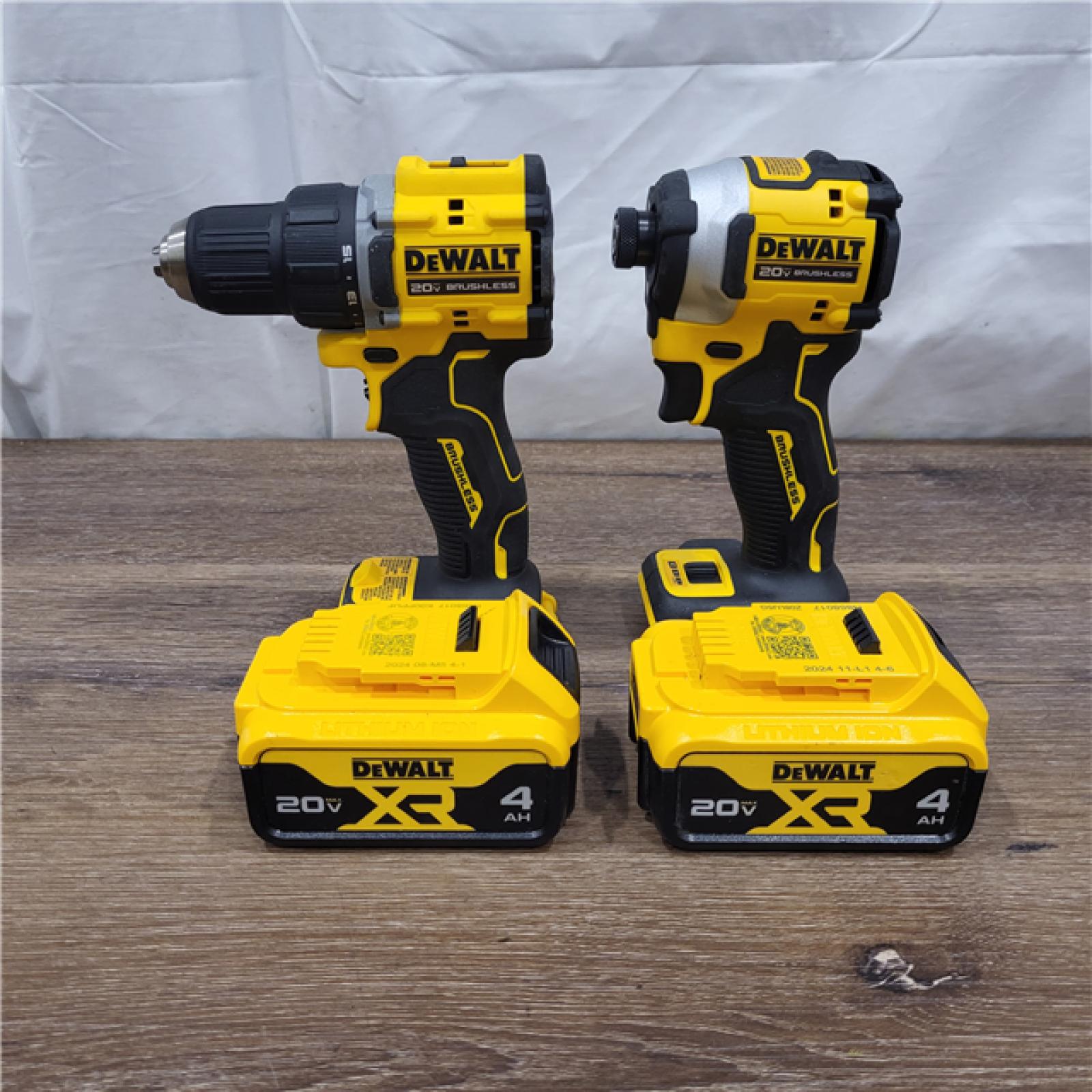 AS-IS 20V MAX XR Hammer Drill and ATOMIC Impact Driver 2 Tool Cordless Combo Kit with (2) 4.0Ah Batteries, Charger, and Bag