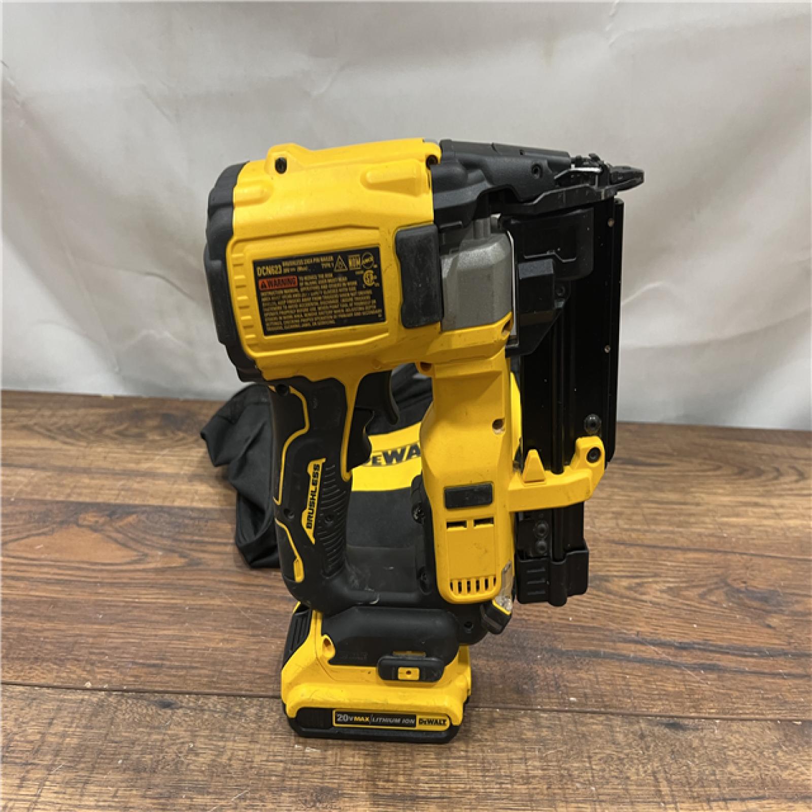 AS IS DEWALT ATOMIC 20V MAX Lithium Ion Cordless 23 Gauge Pin Nailer Kit with 3.0Ah Battery and Charger