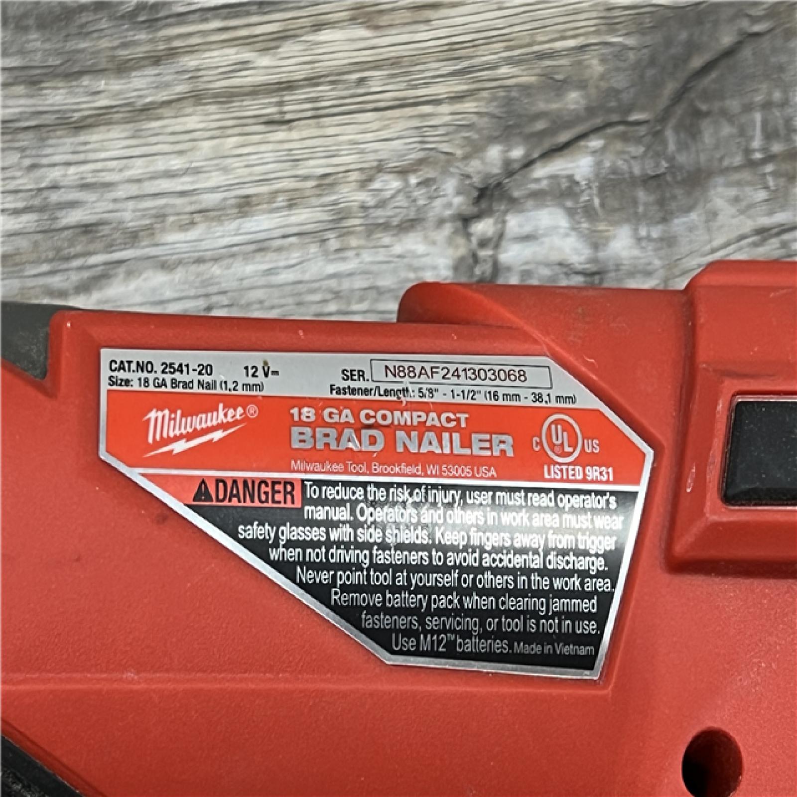 AS-IS MILWAUKEE M12 FUEL 12-Volt Lithium-Ion Brushless Cordless 18-Guage Compact Brad Nailer (Tool Only)