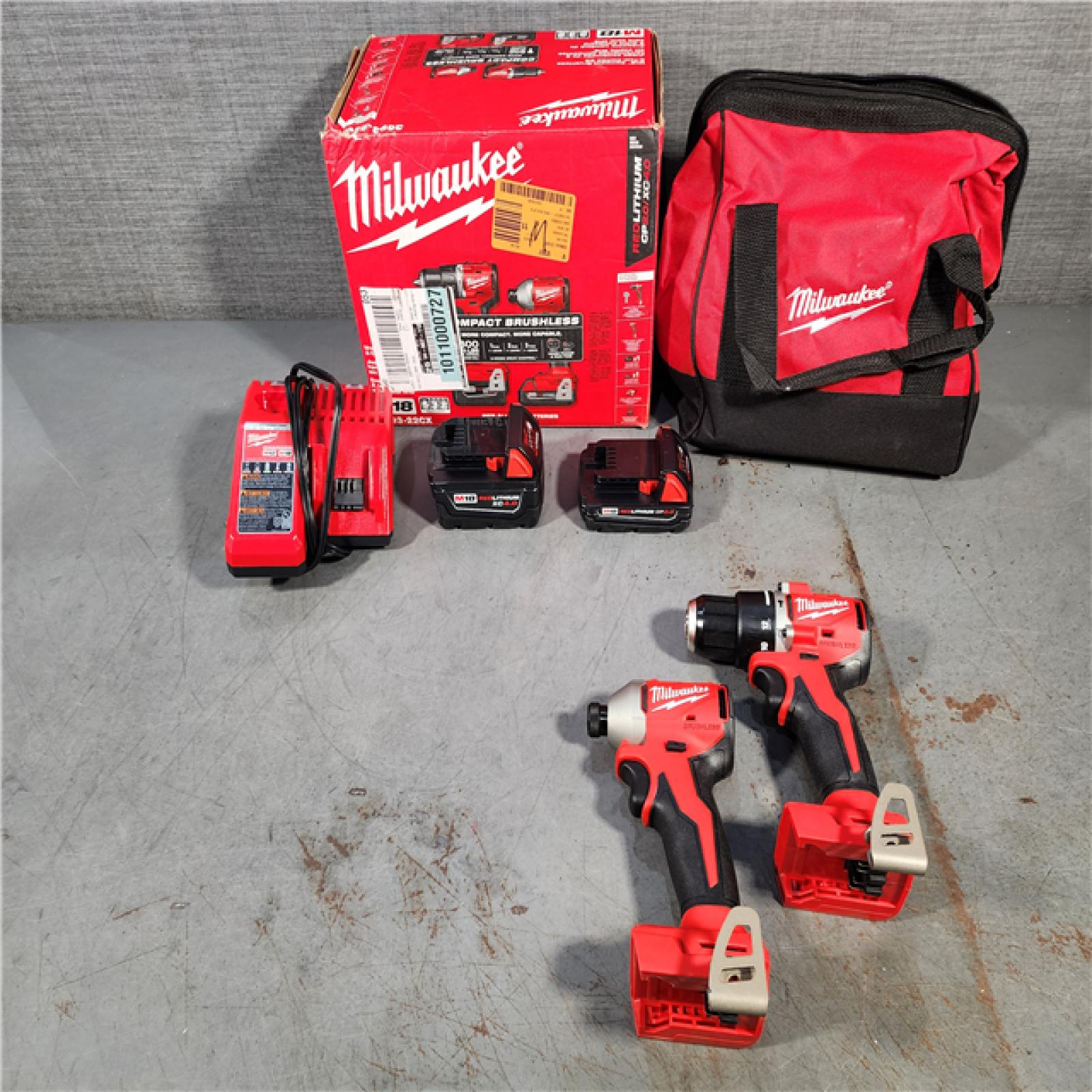 HOUSTON LOCATION - AS-IS M18 18-Volt Lithium-Ion Brushless Cordless Compact Hammer Drill/Impact Combo Kit (2-Tool) with (2) Batteries, Bag