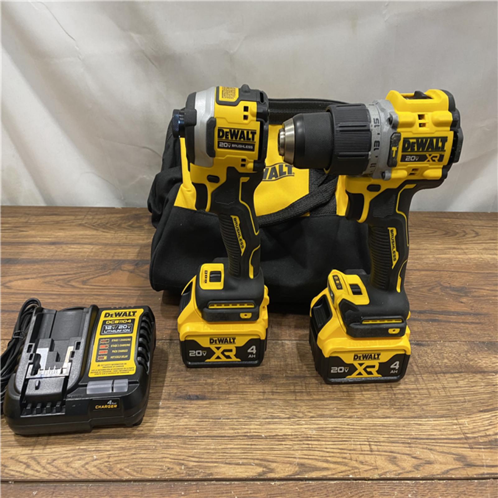 AS IS DEWALT 20V MAX XR Hammer Drill and ATOMIC Impact Driver 2 Tool Cordless Combo Kit with (2) 4.0Ah Batteries, Charger, and Bag