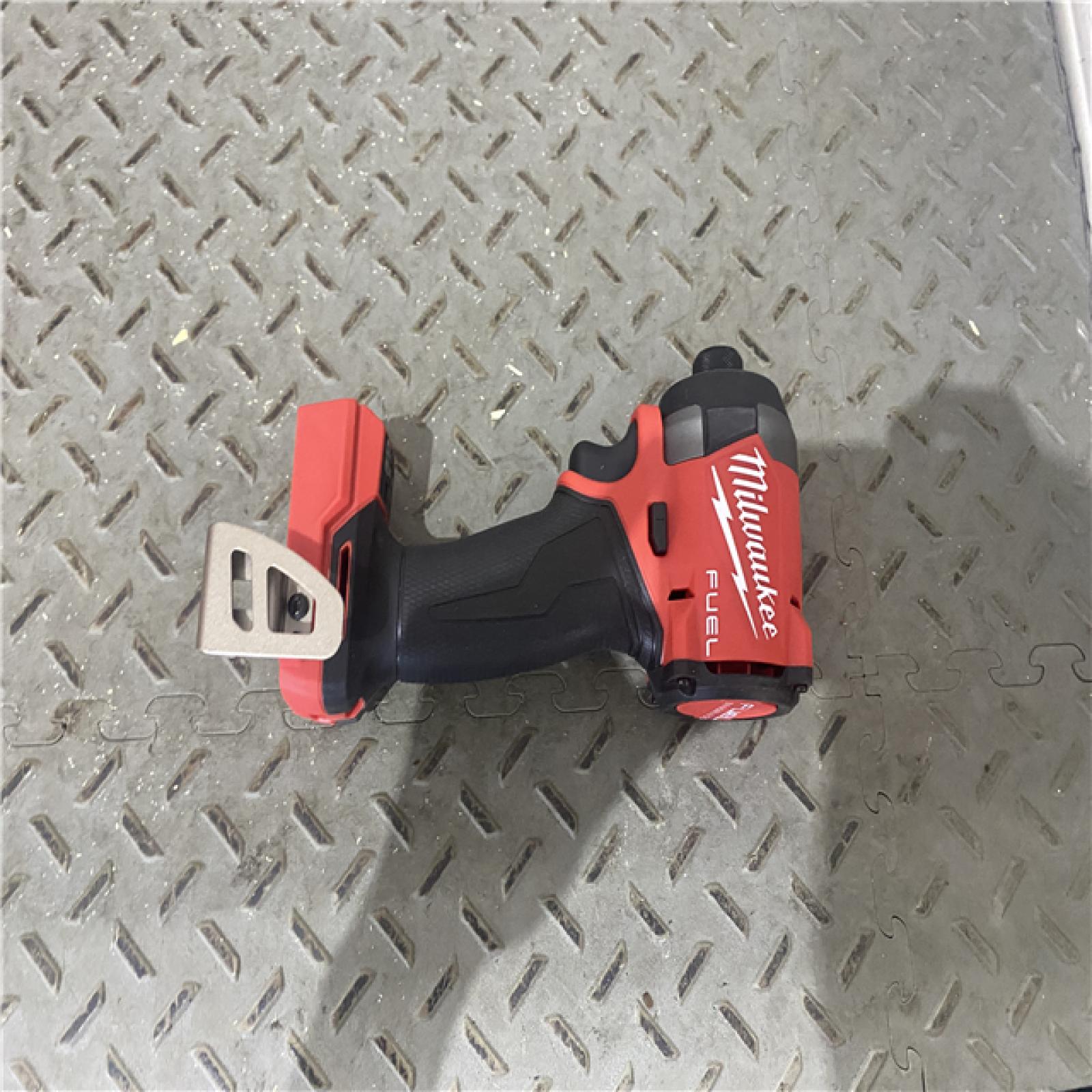 Houston location AS-IS MILWAUKEE M18 FUEL 18V Lithium-Ion Brushless Cordless 1/2 in. Impact Wrench with Friction Ring (Tool-Only)