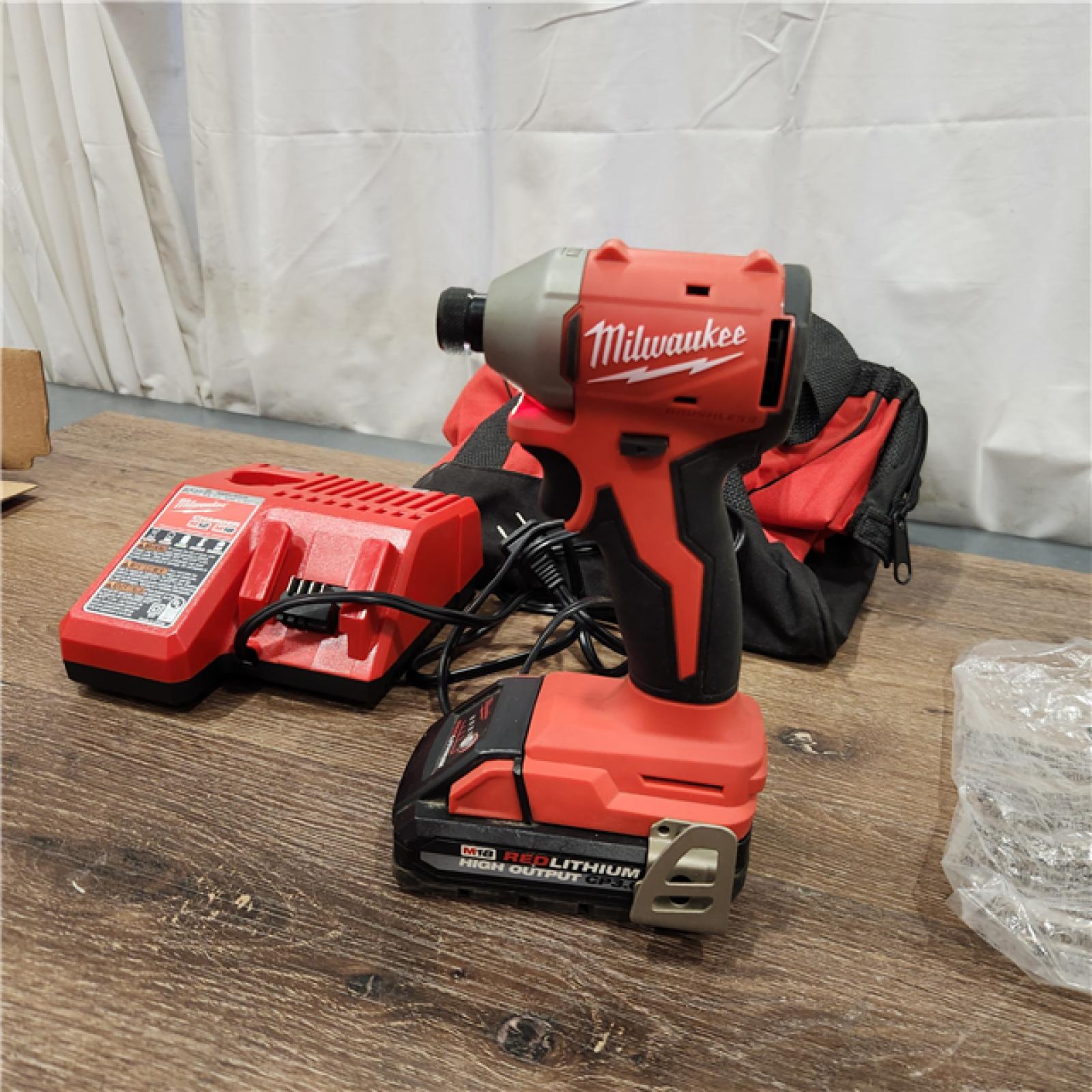 AS-IS Milwaukee M18 Compact Brushless 1/4  Hex Impact Driver Kit