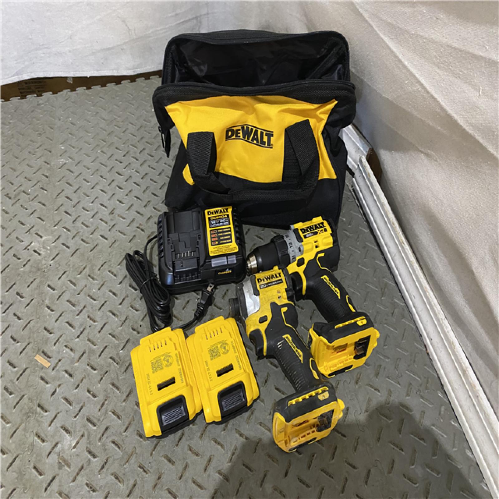 Houston location AS-IS DEWALT 20V MAX XR Cordless Drill/Driver, ATOMIC Impact Driver 2 Tool Combo Kit, (2) 2.0Ah Batteries, Charger, and Bag