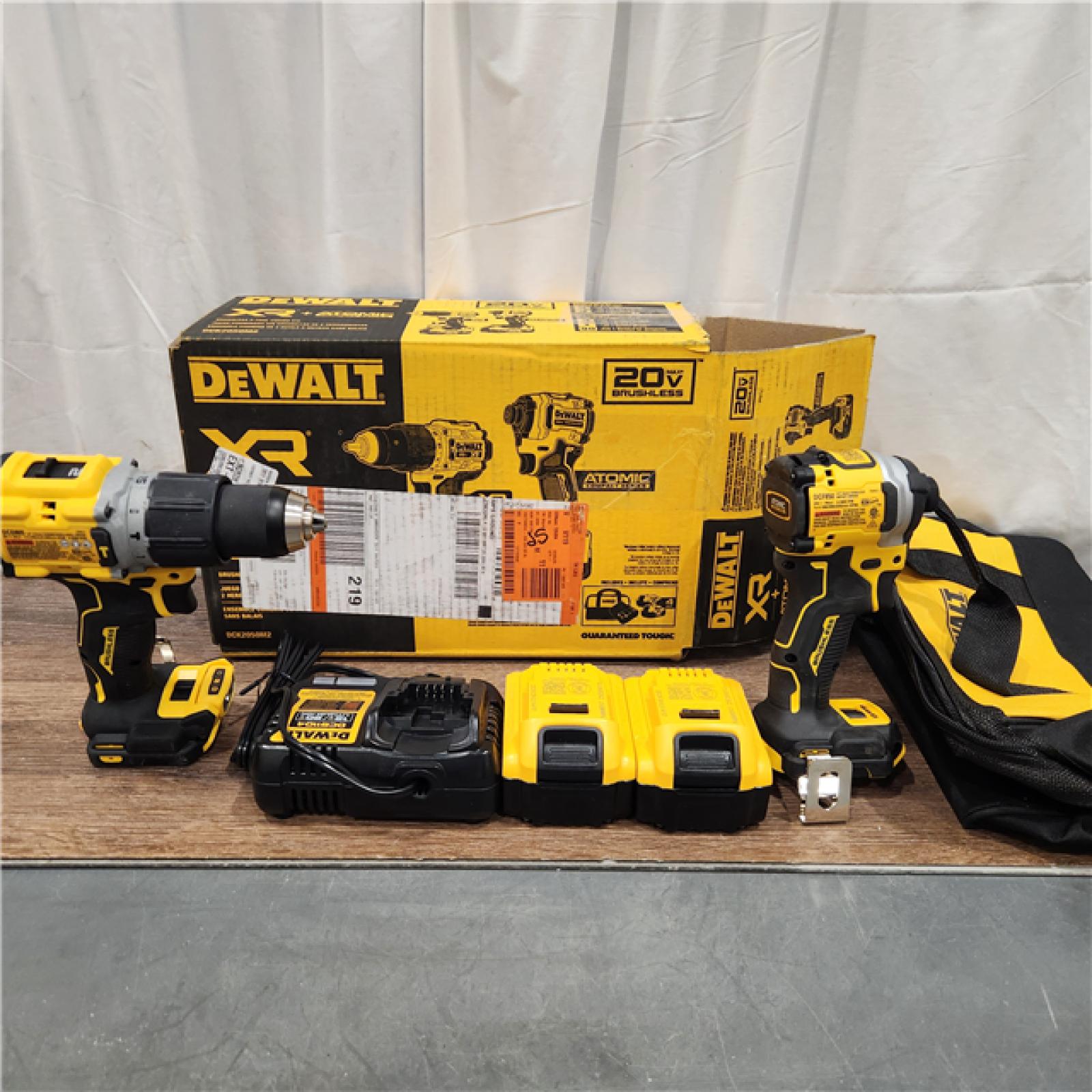 AS IS DEWALT 20V MAX XR Hammer Drill and ATOMIC Impact Driver 2 Tool Cordless Combo Kit with (2) 4.0Ah Batteries, Charger, and Bag