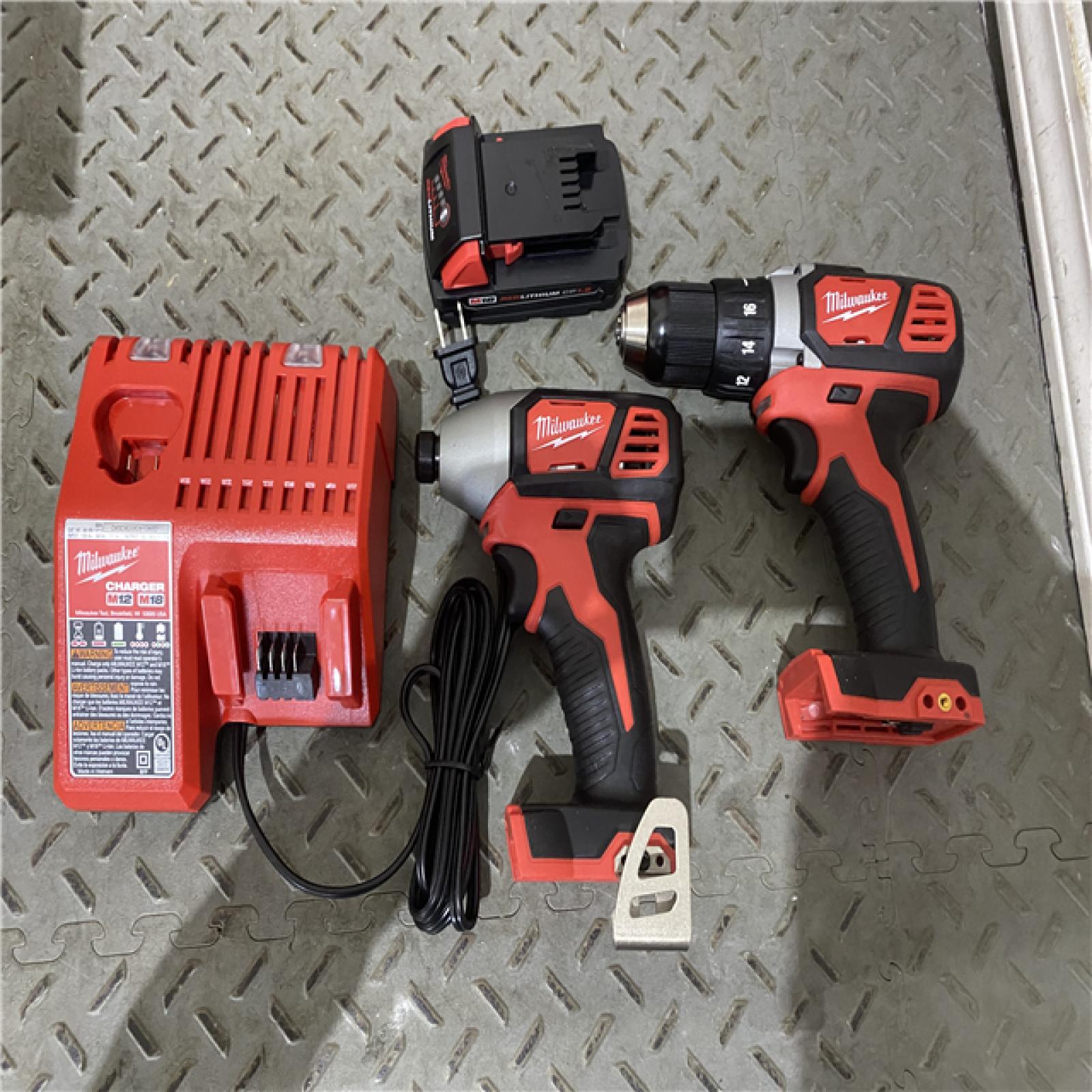 Houston location AS-IS Milwaukee Electric Tools 2691-22 MILWAUKEE M18 COMBO KITS LIKE NEW (MISSING ONE BATTERY)