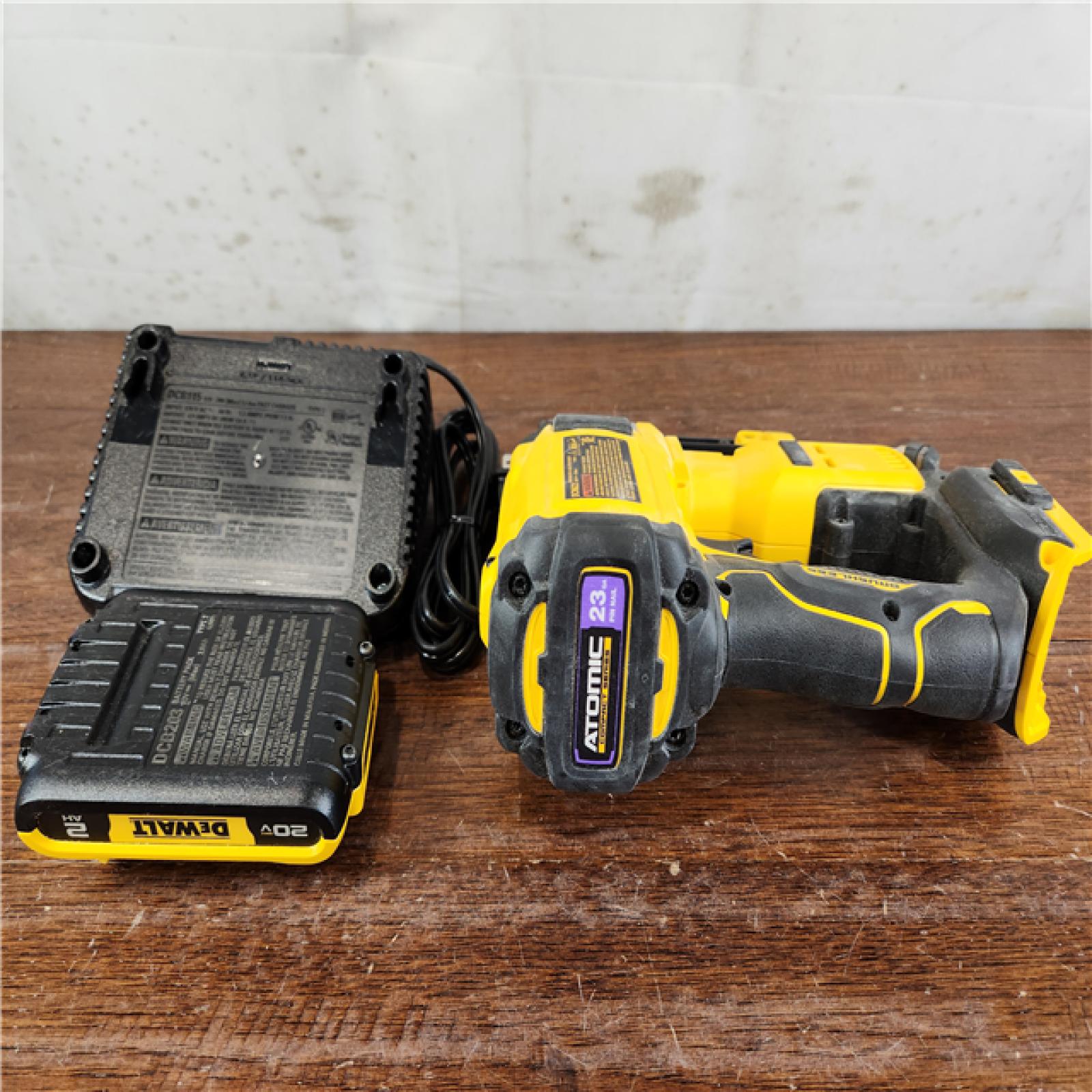 AS-IS DEWALT ATOMIC COMPACT 20V MAX Brushless Cordless 23 Ga. Pin Nailer Kit