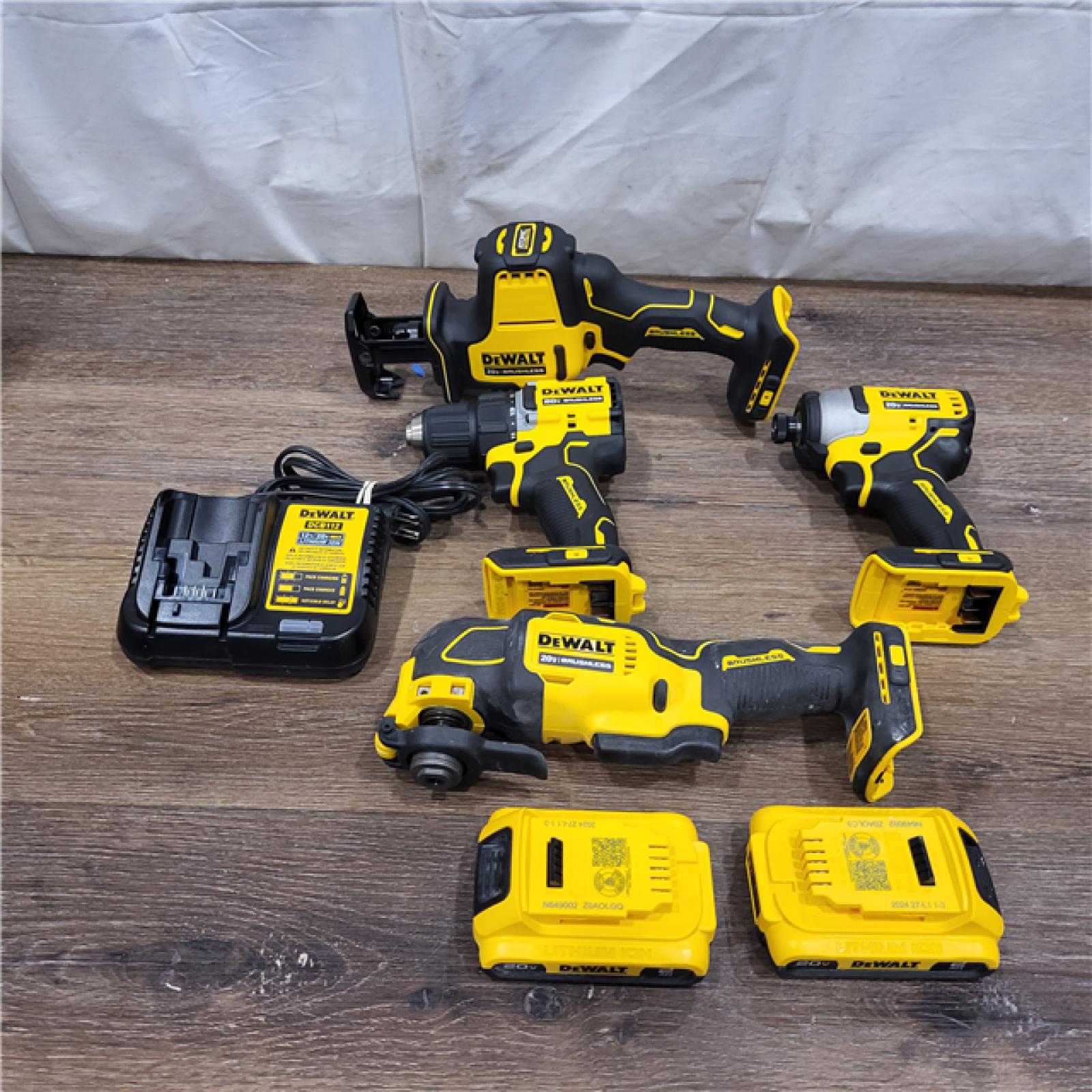 AS-IS DeWalt 20V MAX ATOMIC Cordless Brushless 4 Tool Combo Kit