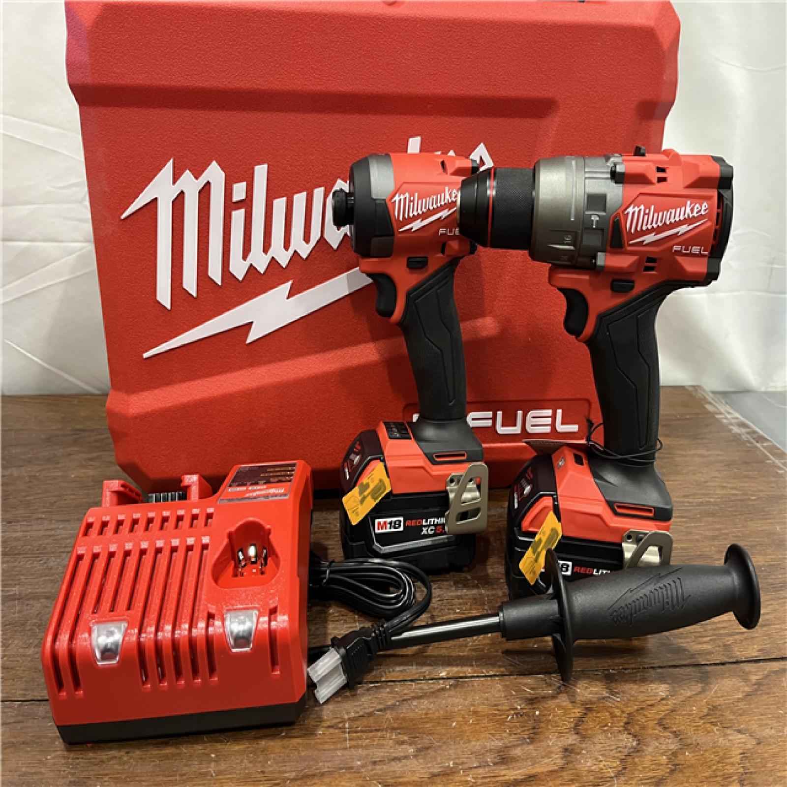 AS-ISMilwaukee M18 FUEL 18V Lithium-Ion Brushless Cordless Hammer Drill and Impact Driver Combo Kit (2-Tool) with 2 Batteries