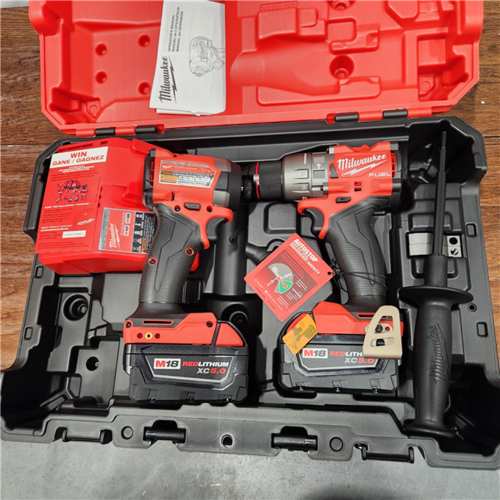 AS-IS Milwaukee M18 FUEL 18V Lithium-Ion Brushless Cordless Hammer Drill and Impact Driver Combo Kit (2-Tool) with 2 Batteries