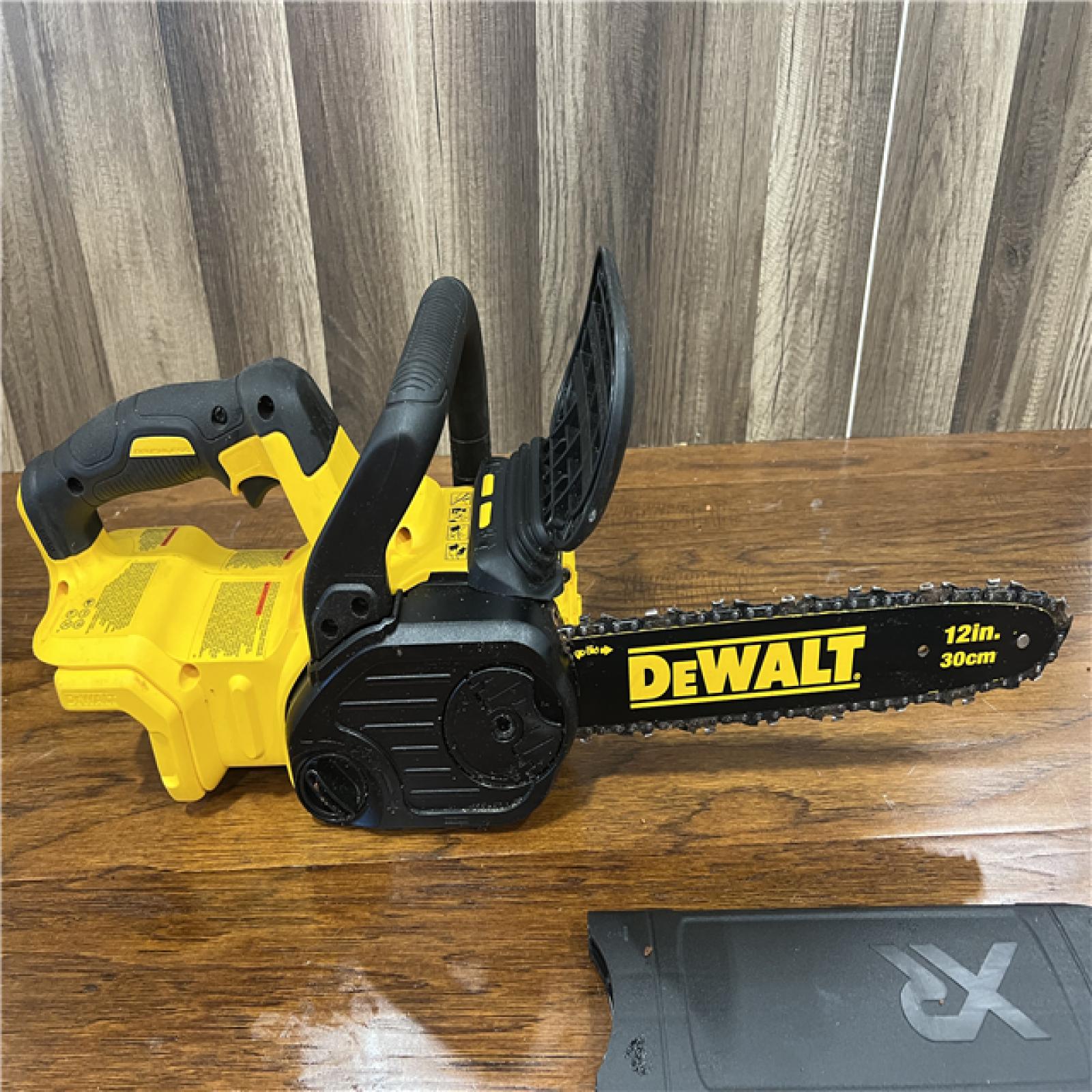 AS-IS Dewalt 7605686 12 in. 20V Battery Powered Chainsaw