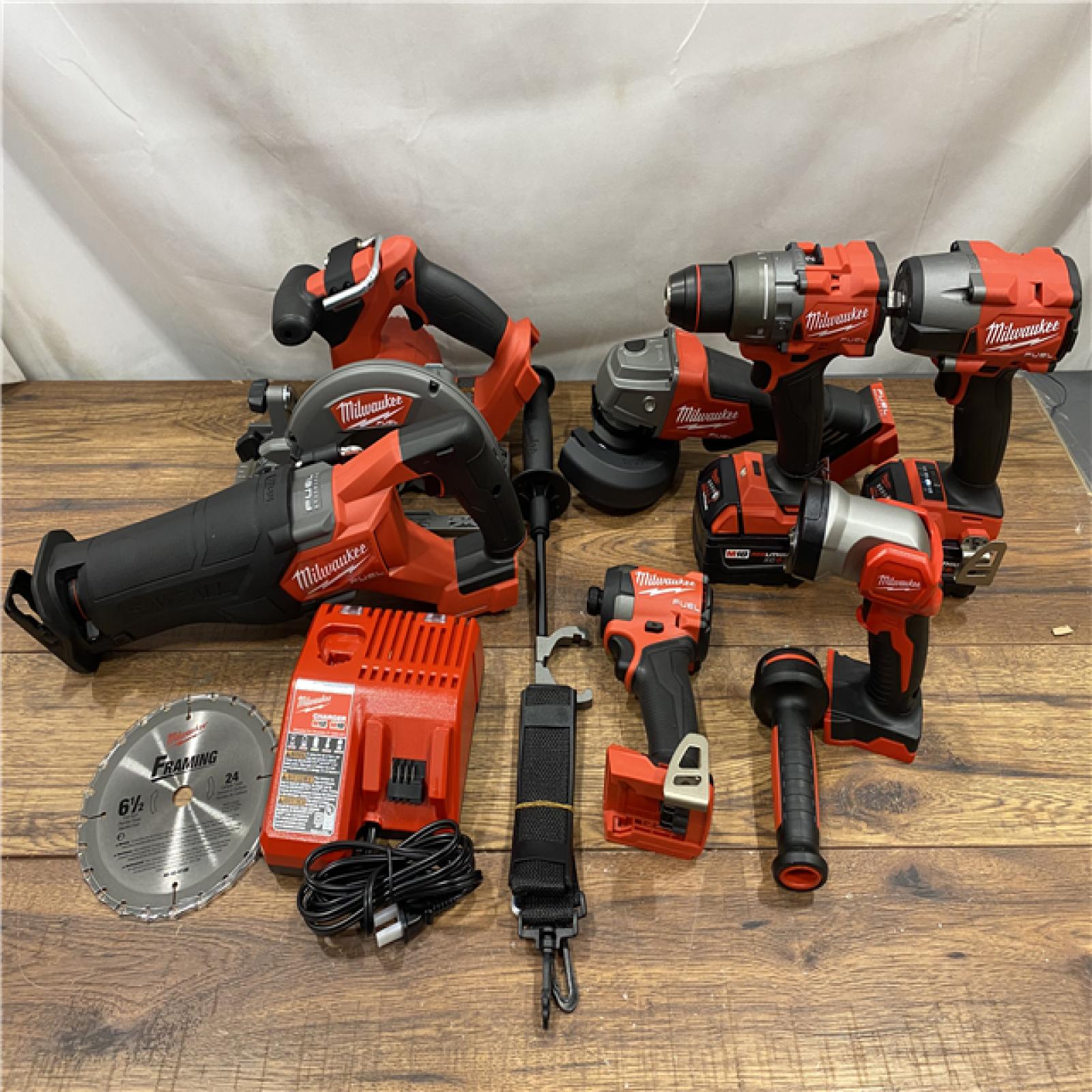 AS IS Milwaukee M18 FUEL 18V Lithium-Ion Brushless Cordless Combo Kit with Two 5.0 Ah Batteries  1 Charger  2 Tool Bags (7-Tool)