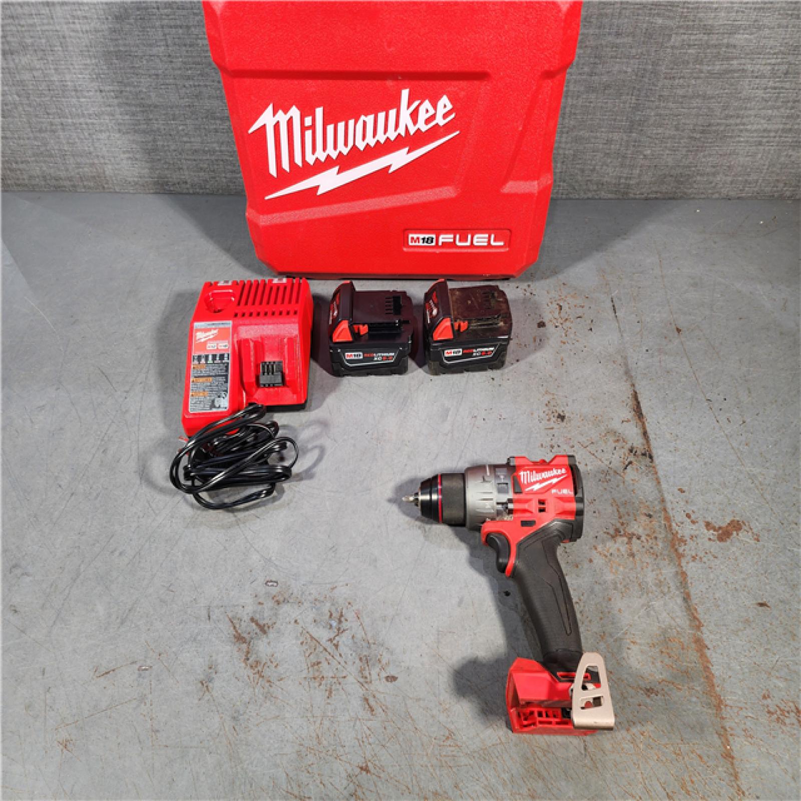 HOUSTON LOCATION - AS-IS Milwaukee 2904-22 Hammer Drill Driver Kit with Batteries  Charger & Tool Case  Red