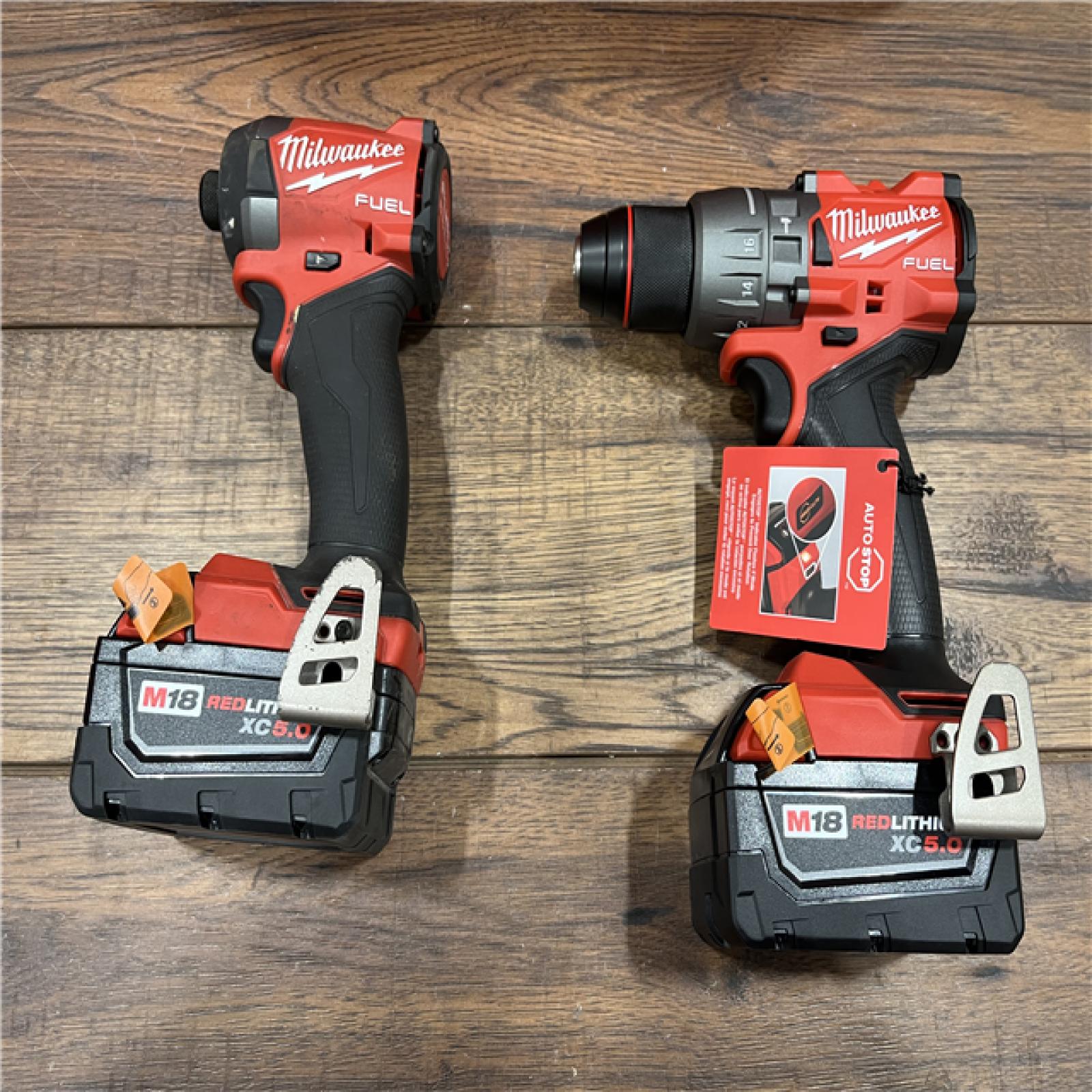 AS-IS Milwaukee M18 FUEL 18V Lithium-Ion Brushless Cordless Hammer Drill and Impact Driver Combo Kit (2-Tool) with 2 Batteries