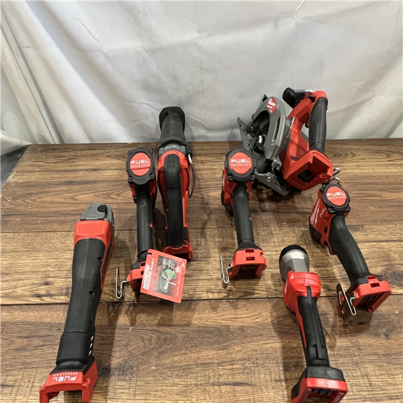 AS IS Milwaukee M18 FUEL 18V Lithium-Ion Brushless Cordless Combo Kit with Two 5.0 Ah Batteries  1 Charger  2 Tool Bags (7-Tool)