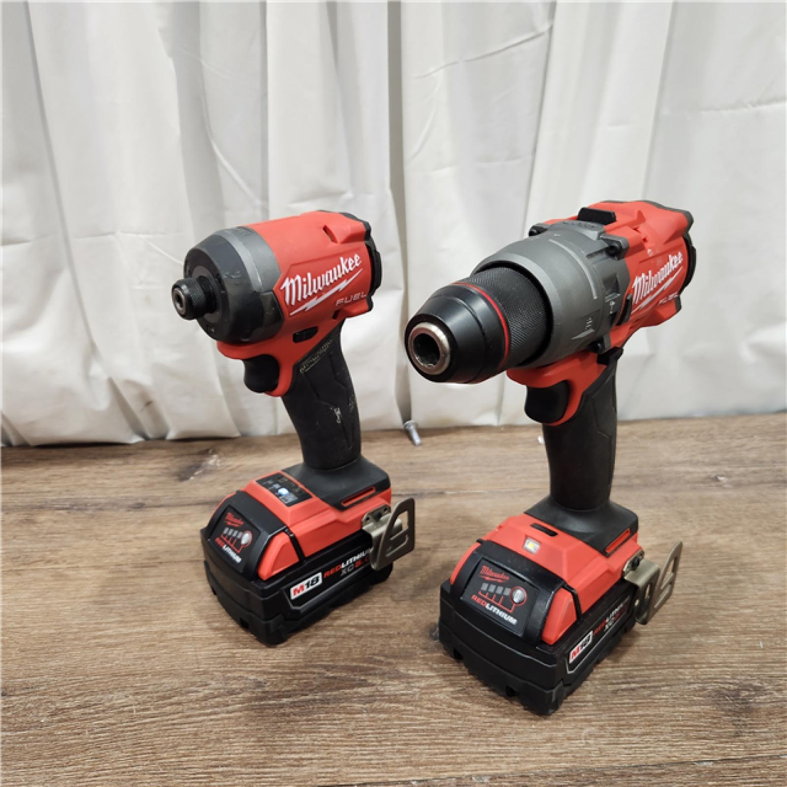 AS-IS Milwaukee M18 FUEL 18V Lithium-Ion Brushless Cordless Hammer Drill and Impact Driver Combo Kit (2-Tool) with 2 Batteries