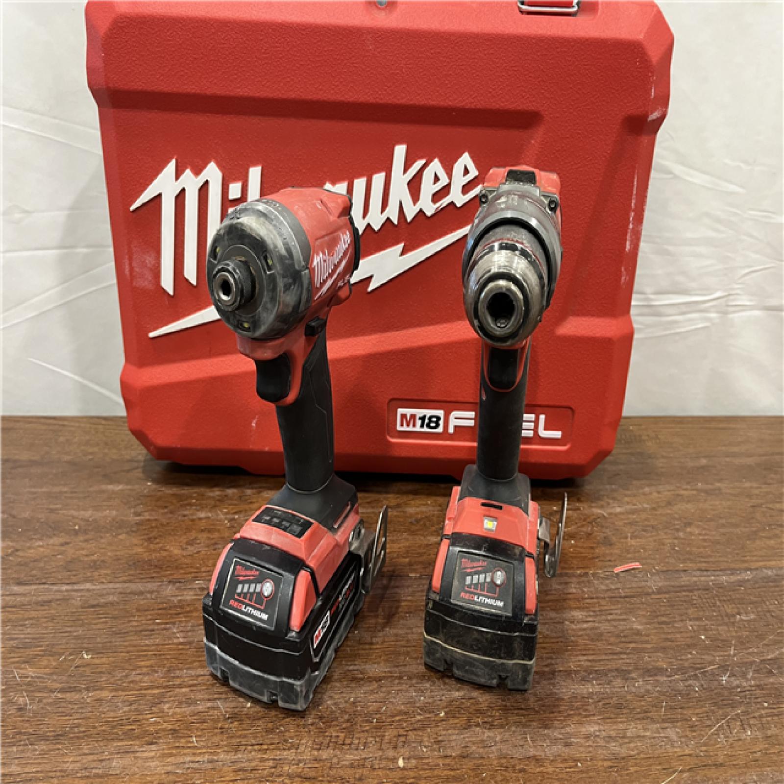 AS-IS Milwaukee M18 FUEL 18V Lithium-Ion Brushless Cordless Hammer Drill and Impact Driver Combo Kit (2-Tool) with 2 Batteries