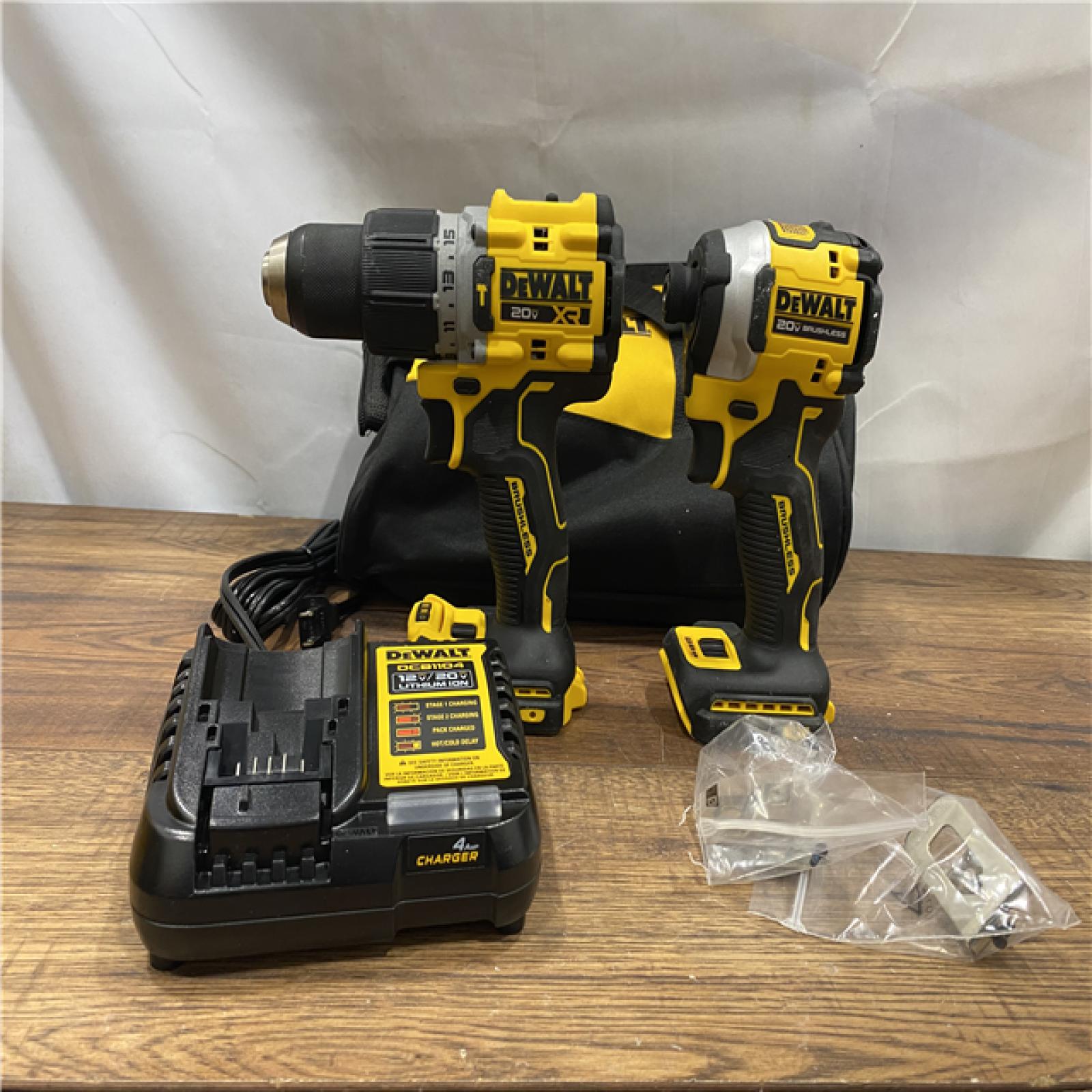 AS-IS DEWALT 20V MAX XR Hammer Drill and ATOMIC Impact Driver 2 Tool Cordless Combo Kit with (2) 4.0Ah Batteries, Charger, and Bag